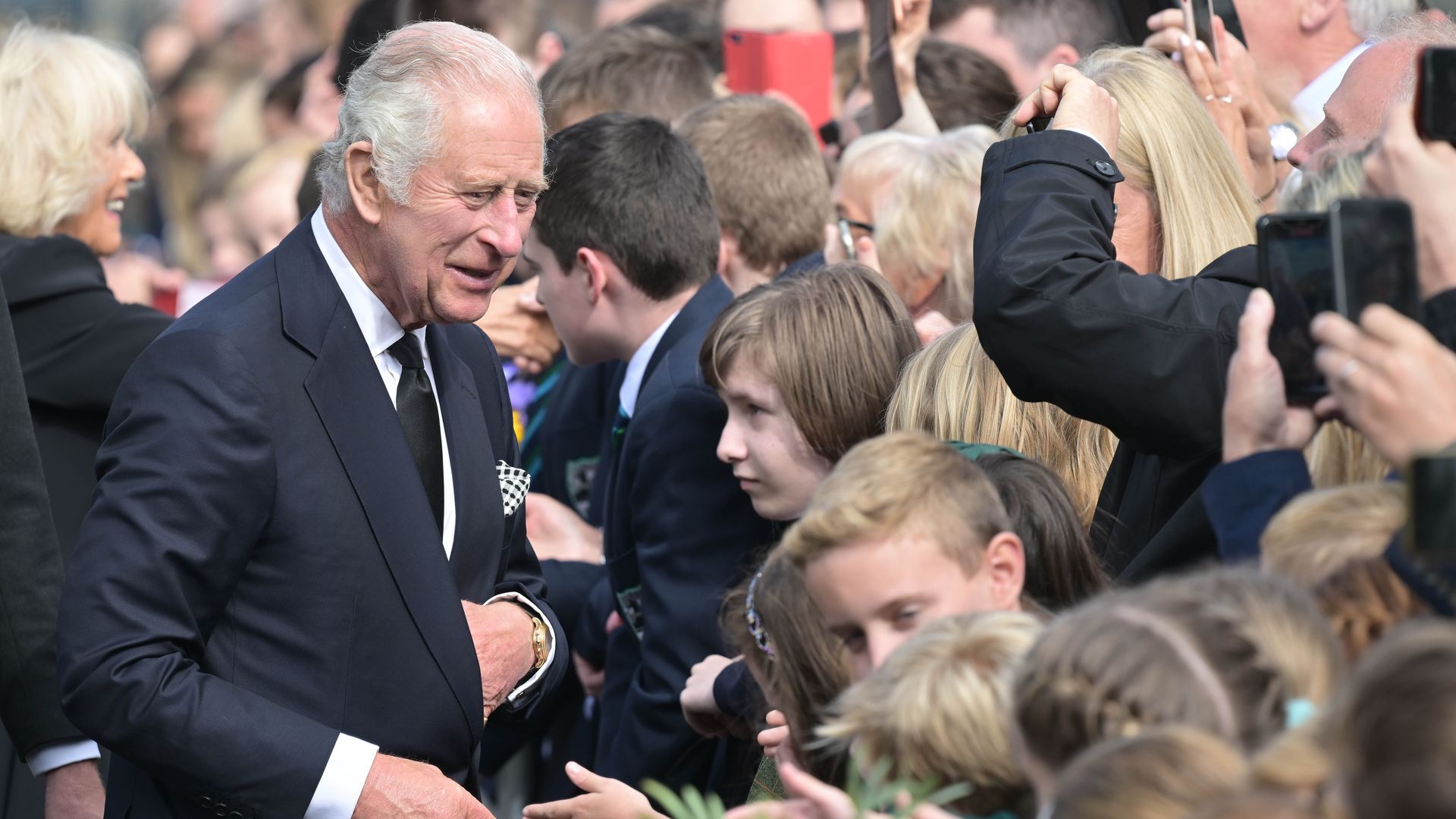 King Charles III accompanied by Camilla, Queen Consort.