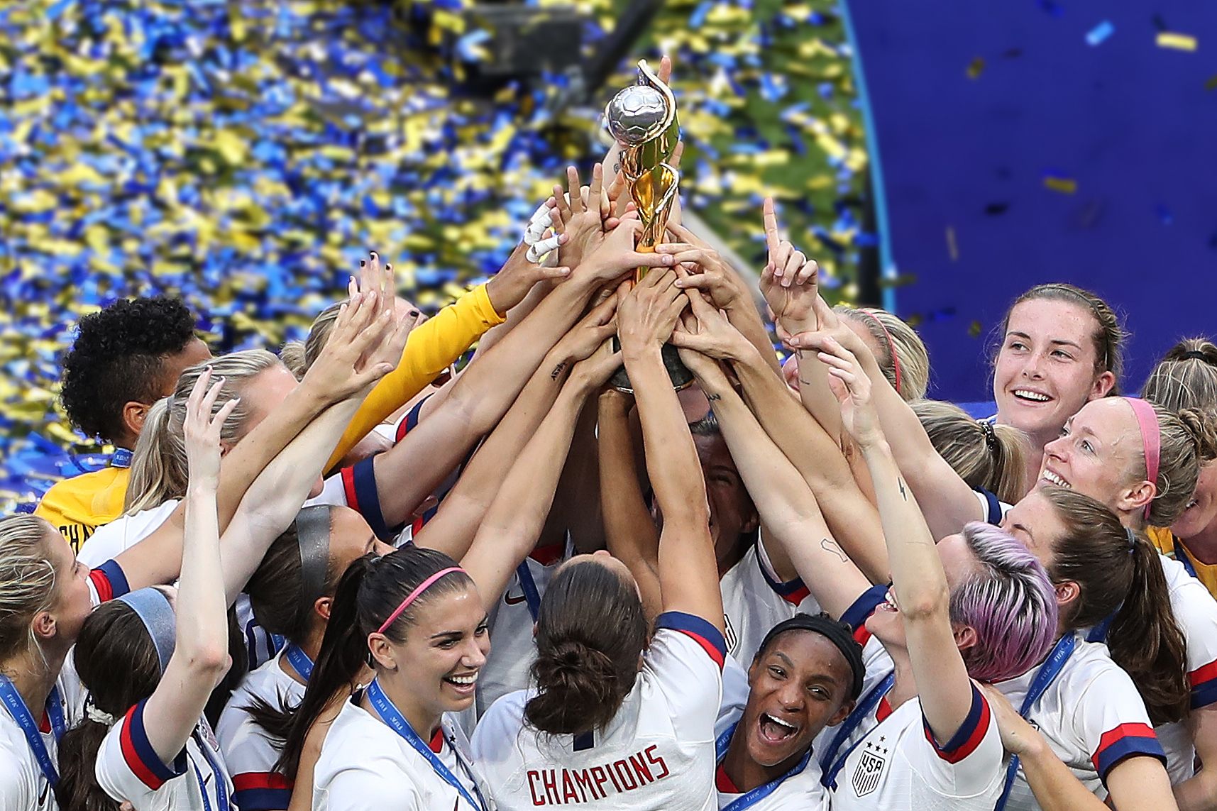 USA celebrate winning their 4th World Cup title with the trophy during the 2019 FIFA Women's World Cup France Final match.