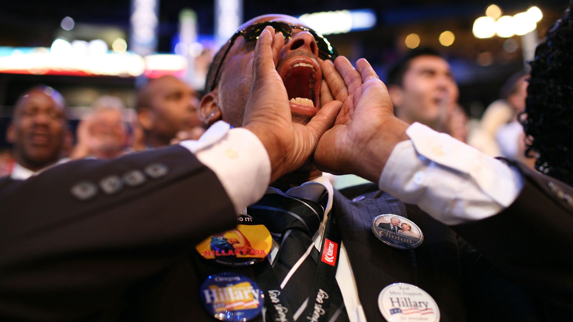 Photo of a man screaming during a political convention 