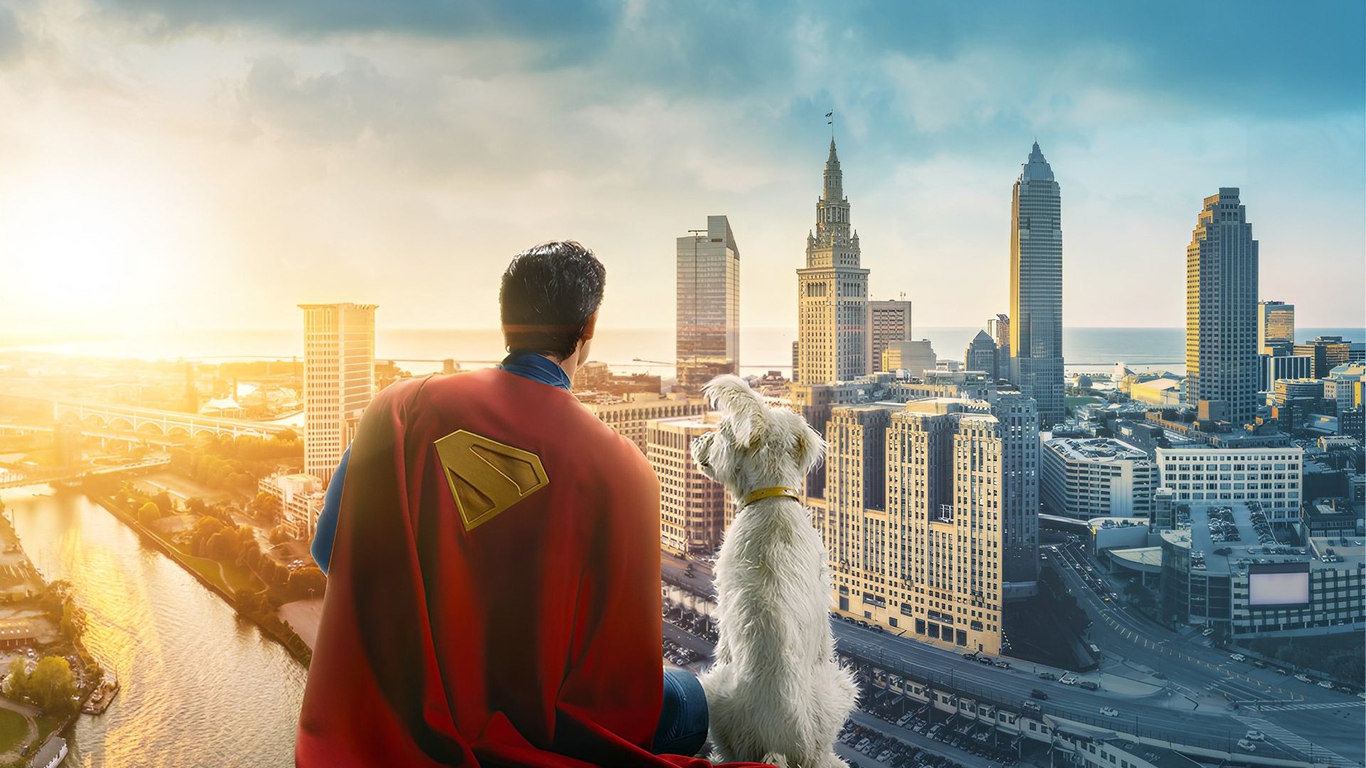Superman and his dog Crypto look out over a Cleveland skyline. 
