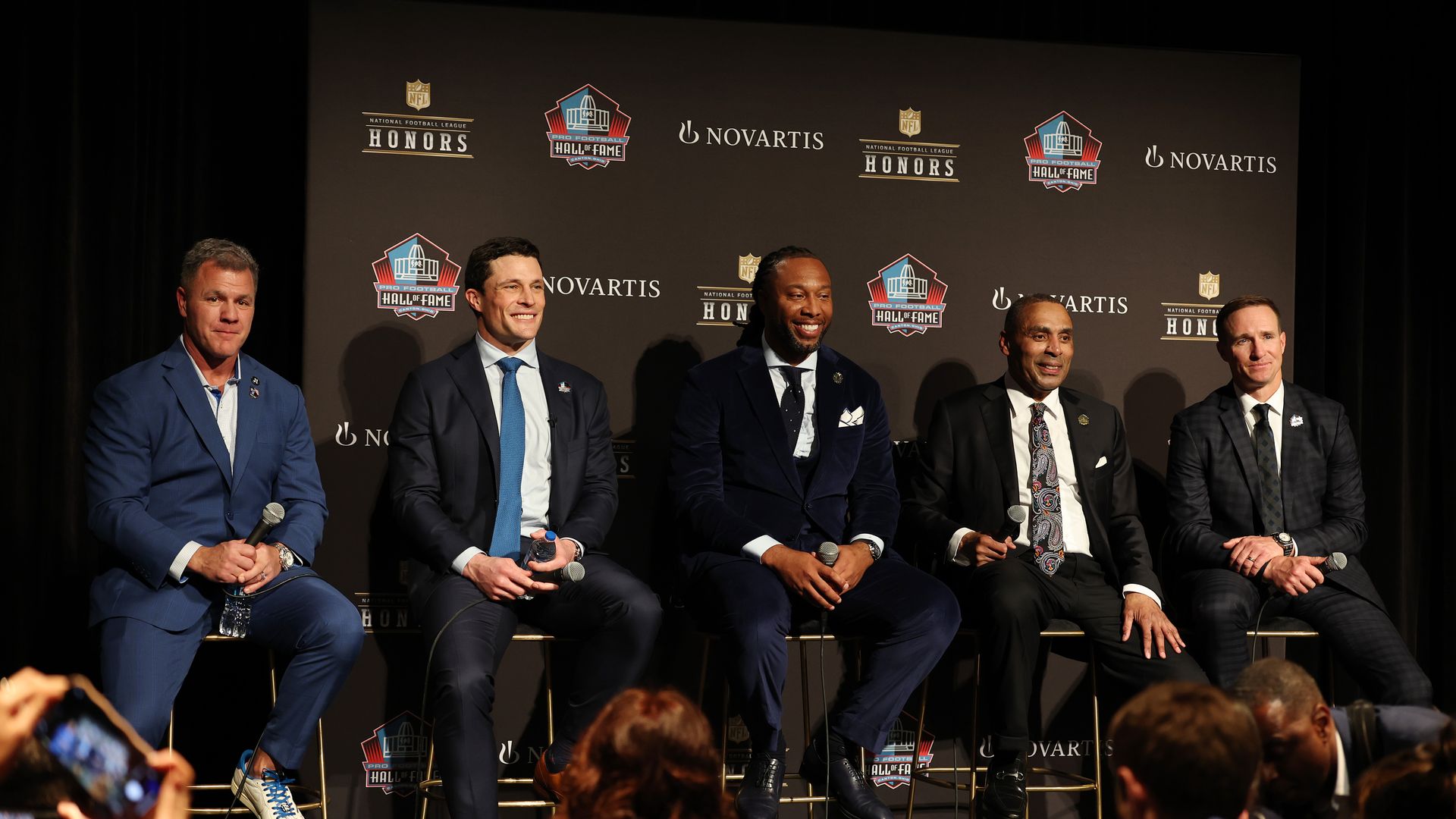 (L-R) 2026 Pro Football Hall of Fame inductees Adam Vinatieri, Luke Kuechly, Larry Fitzgerald, Roger Craig and Drew Brees look on during the 15th Annual NFL Honors at the Palace Of Fine Arts on February 05, 2026 in San Francisco, California. (Photo by Chris Graythen/Getty Images)