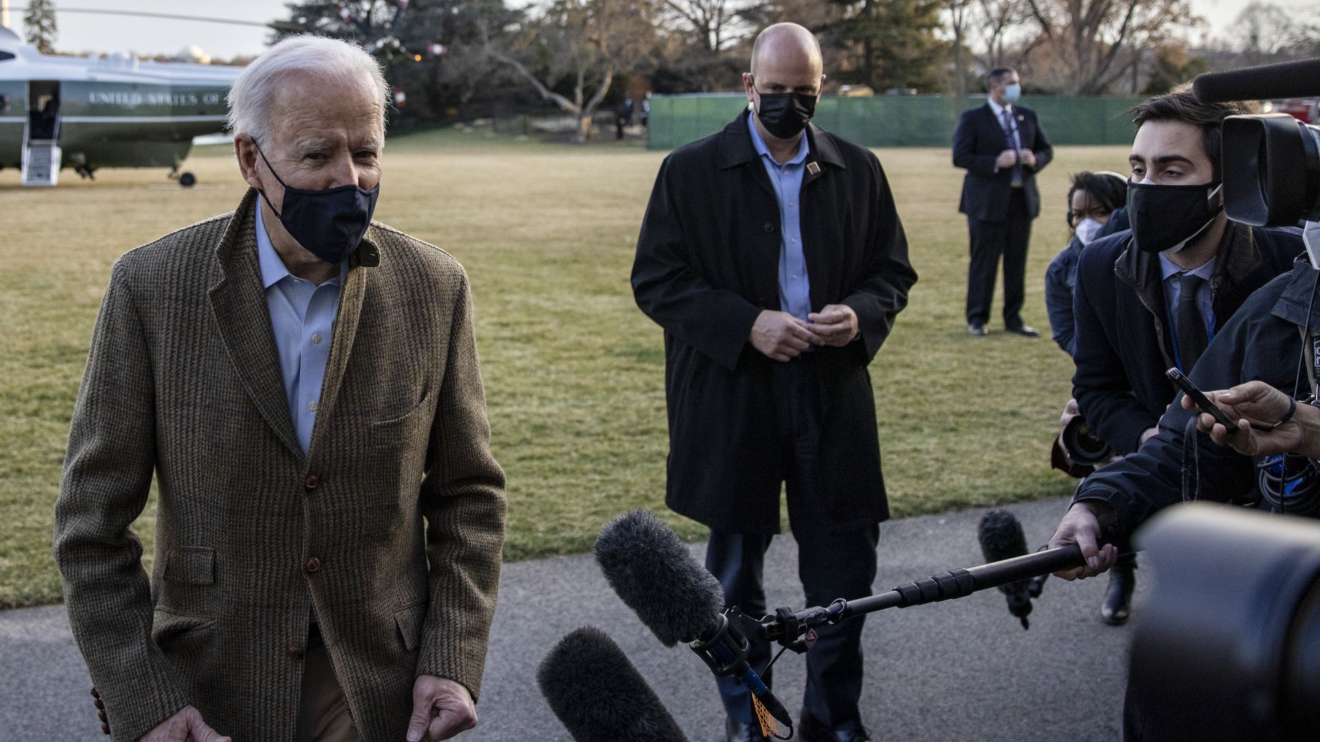  President Joe Biden stops to talk to the media after stepping off Marine One on the South Lawn of the White House on March 14