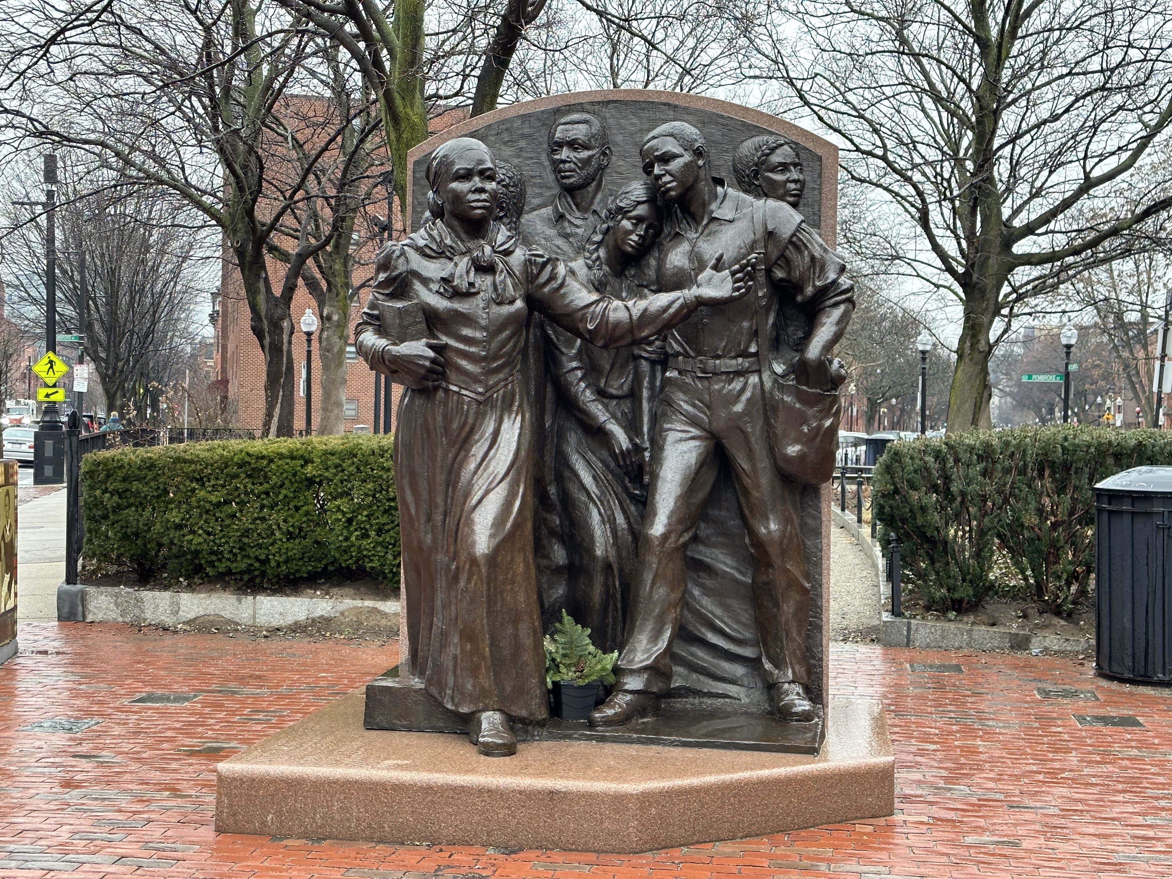 A 10-foot-tall bronze statue in Harriet Tubman Square in the south Ends pictures Harriet Tubman standing in front of four enslaved people, as she helps them escape.