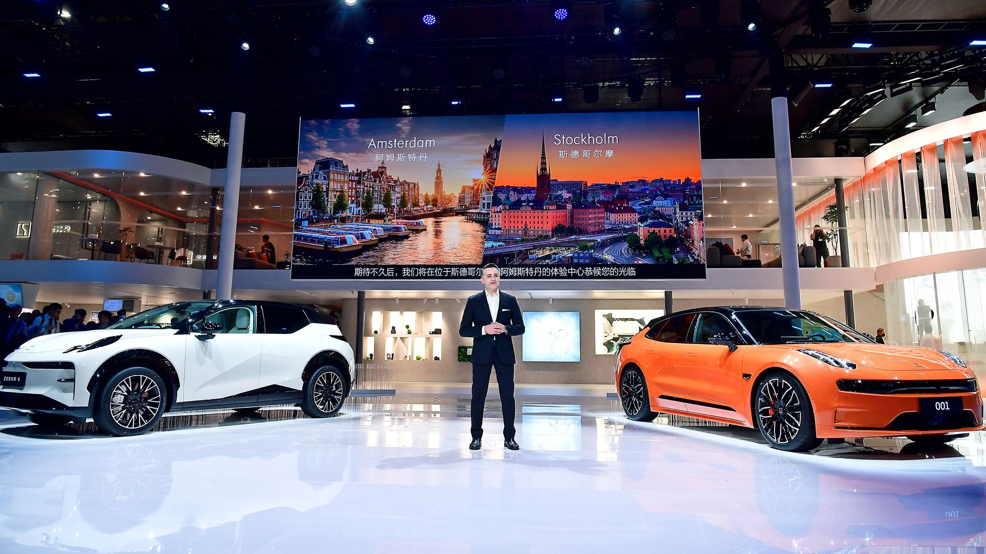 Zeekr electric vehicles at an auto show.