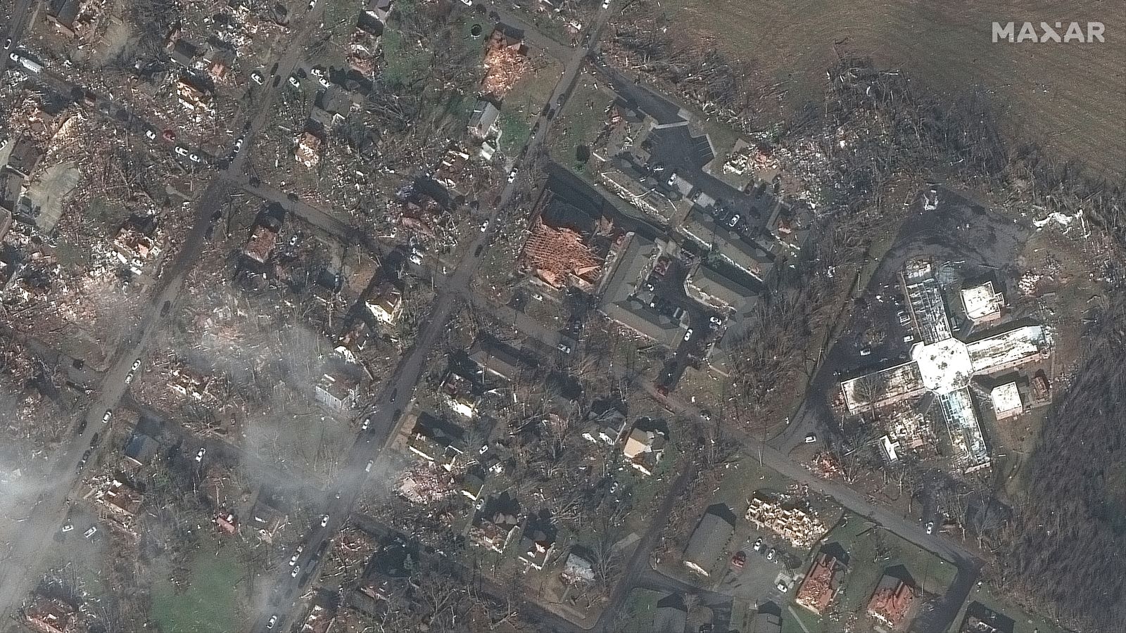 Before-and-after satellite images show destruction of candle factory