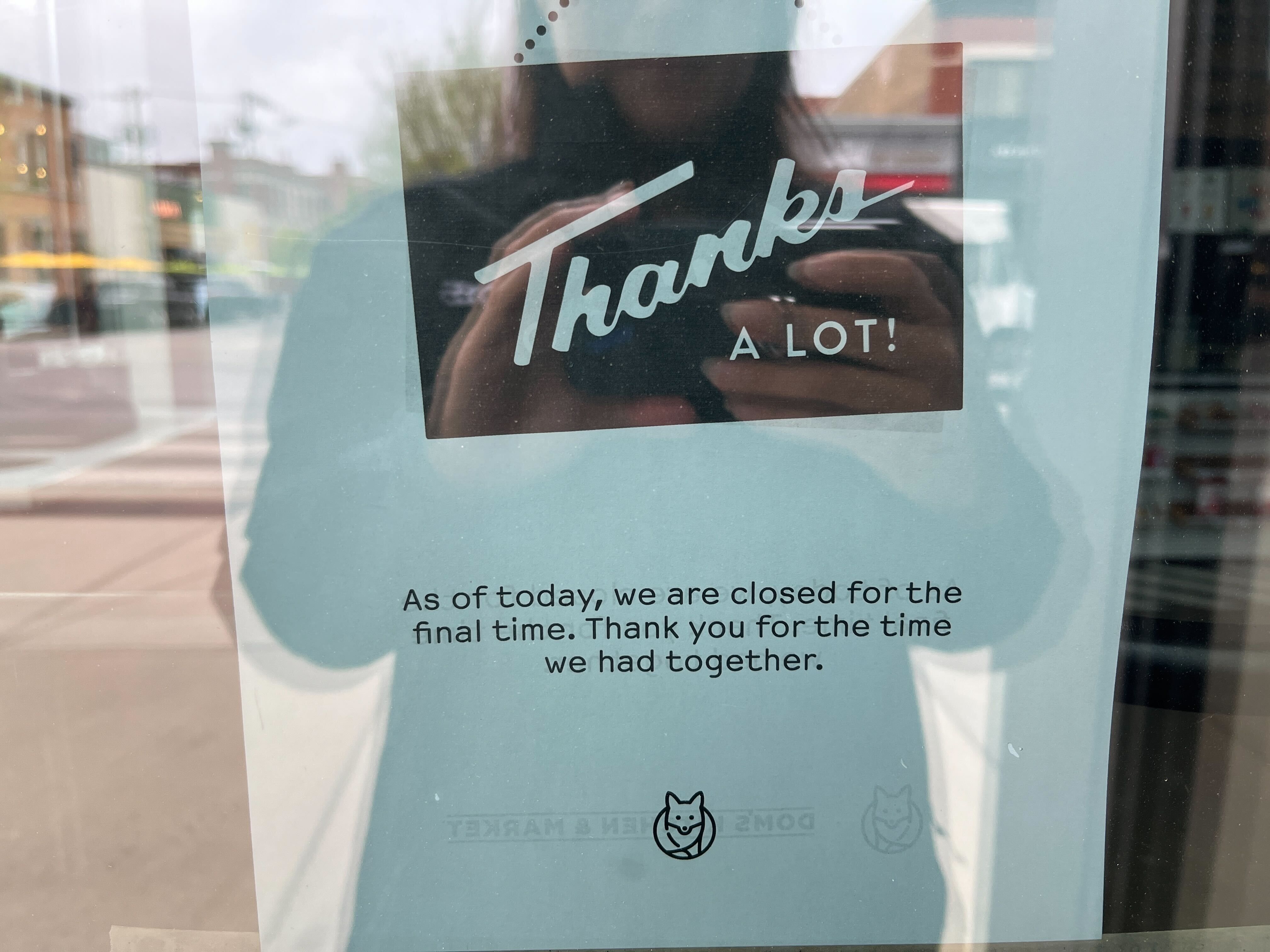 A sign notifying customers of Foxtrot's closure.