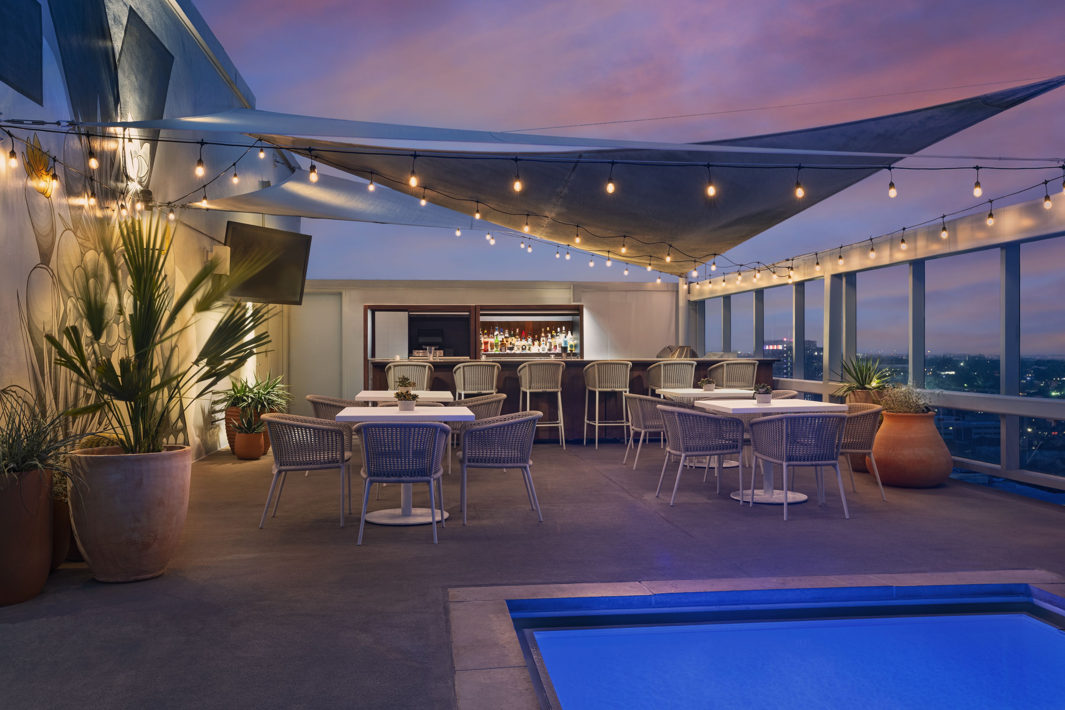 A photo of a pool with a canopy over it.