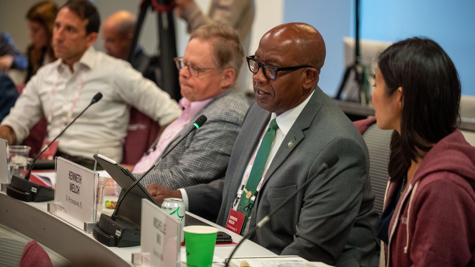 St. Pete Mayor Ken Welch speaking in front of his name tag at the Bloomberg Harvard initiative for mayors.