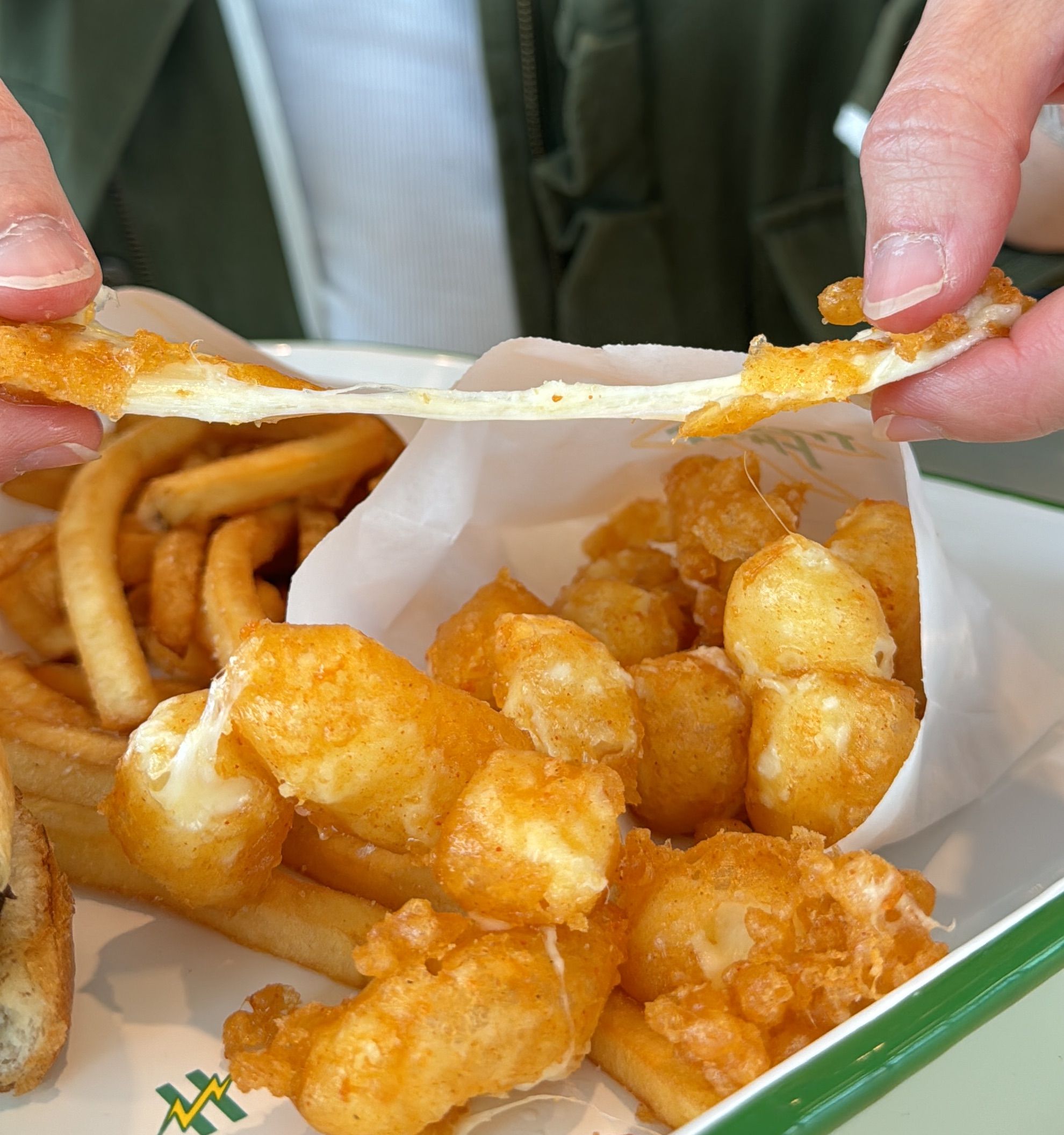 hand pulling cheese curd