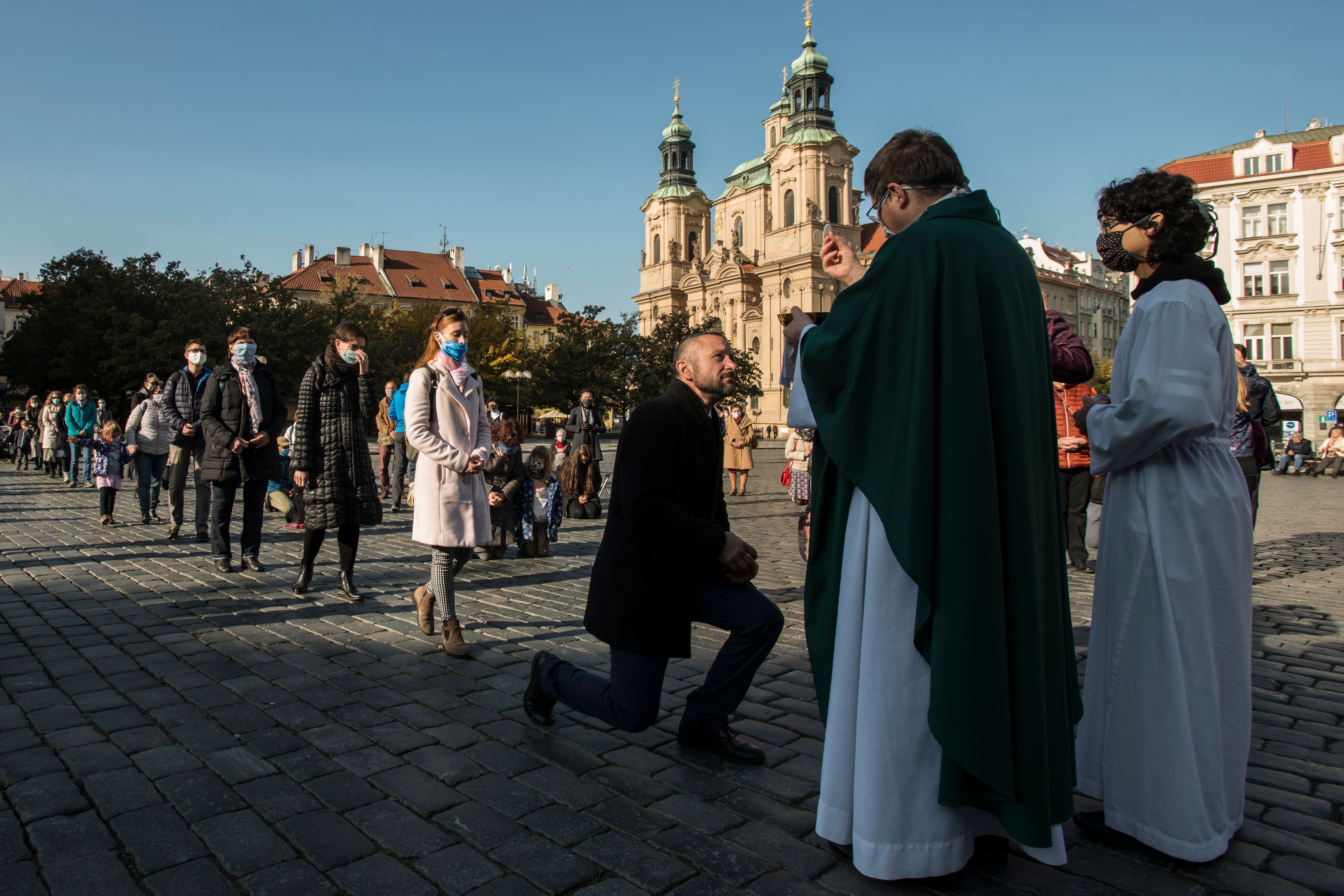 An outdoor mass at the Old Town Square in Prague on Oct. 26. The government is introducing new restrictions, including a 9 p.m. to 5 a.m. curfew, effective Oct. 28 through Nov. 3. 