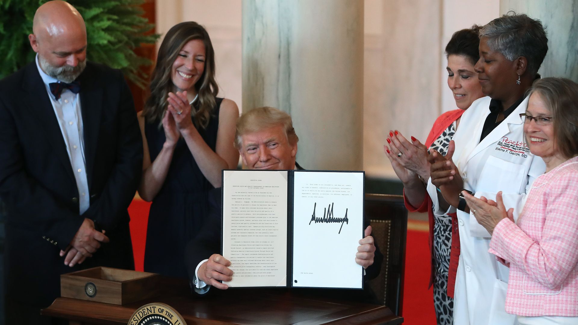 President Trump signs a health care executive order.