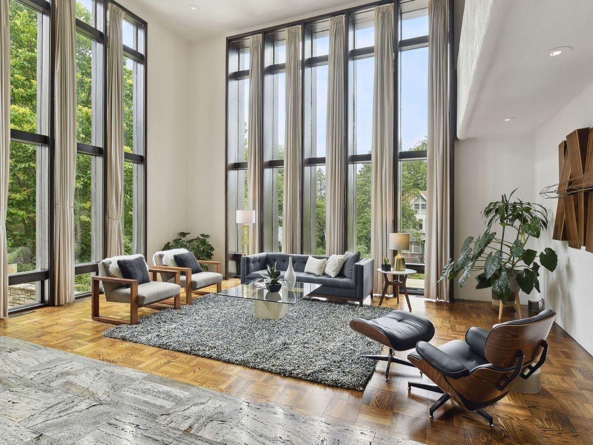 living room with floor to ceiling windows