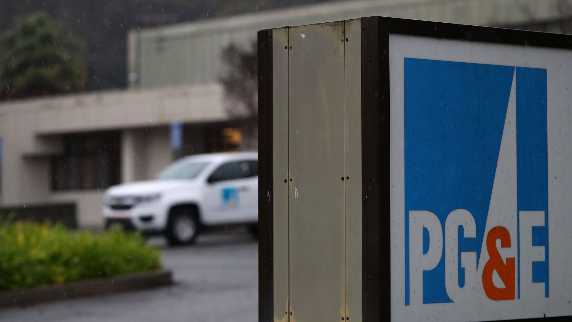 Sign and truck outside a PG&E office