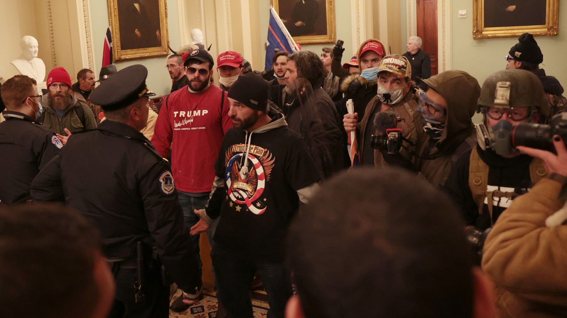  Protesters interact with Capitol Police inside the U.S. Capitol Building 