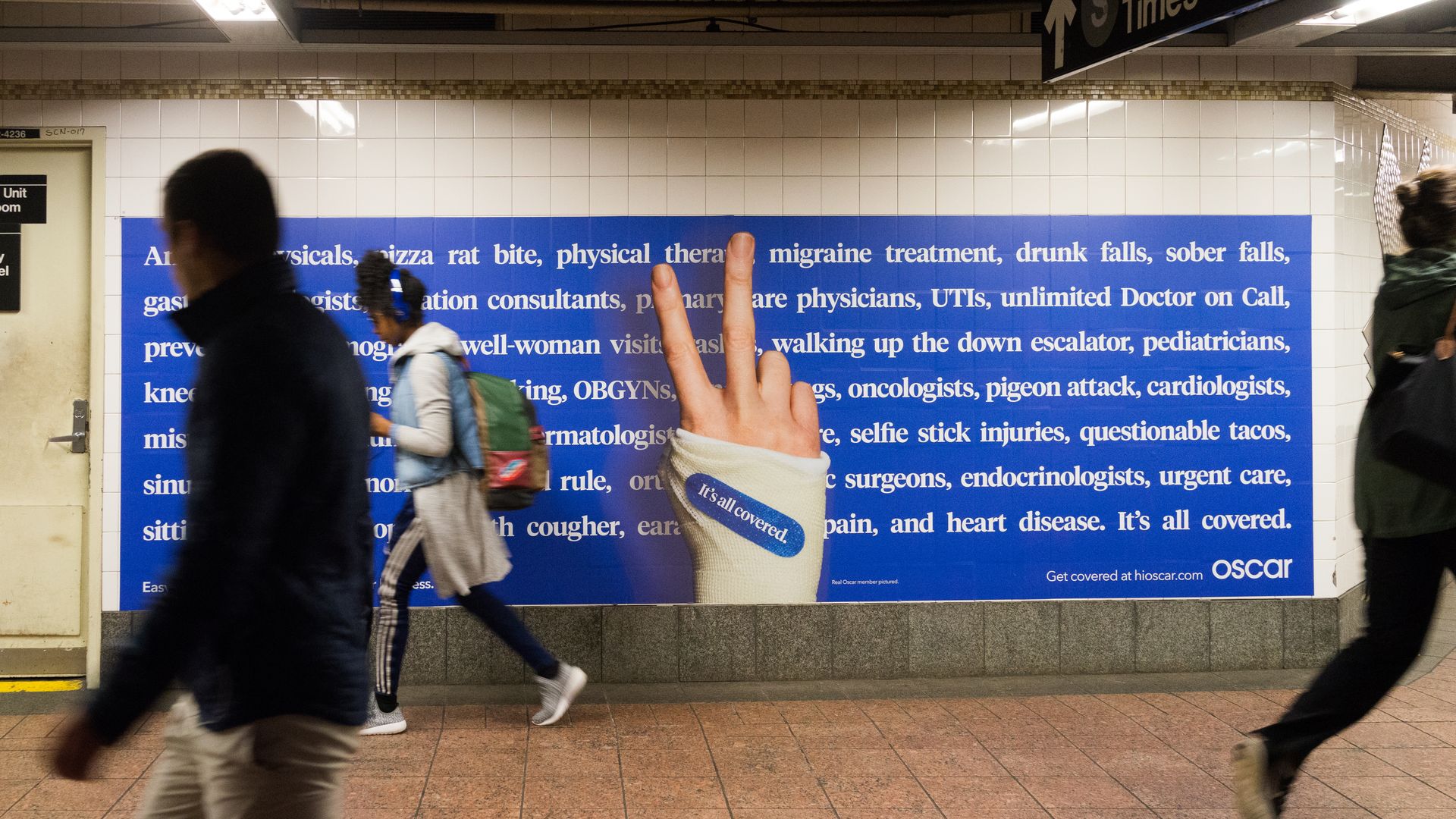 An advertisement for Oscar health insurance in a New York subway.