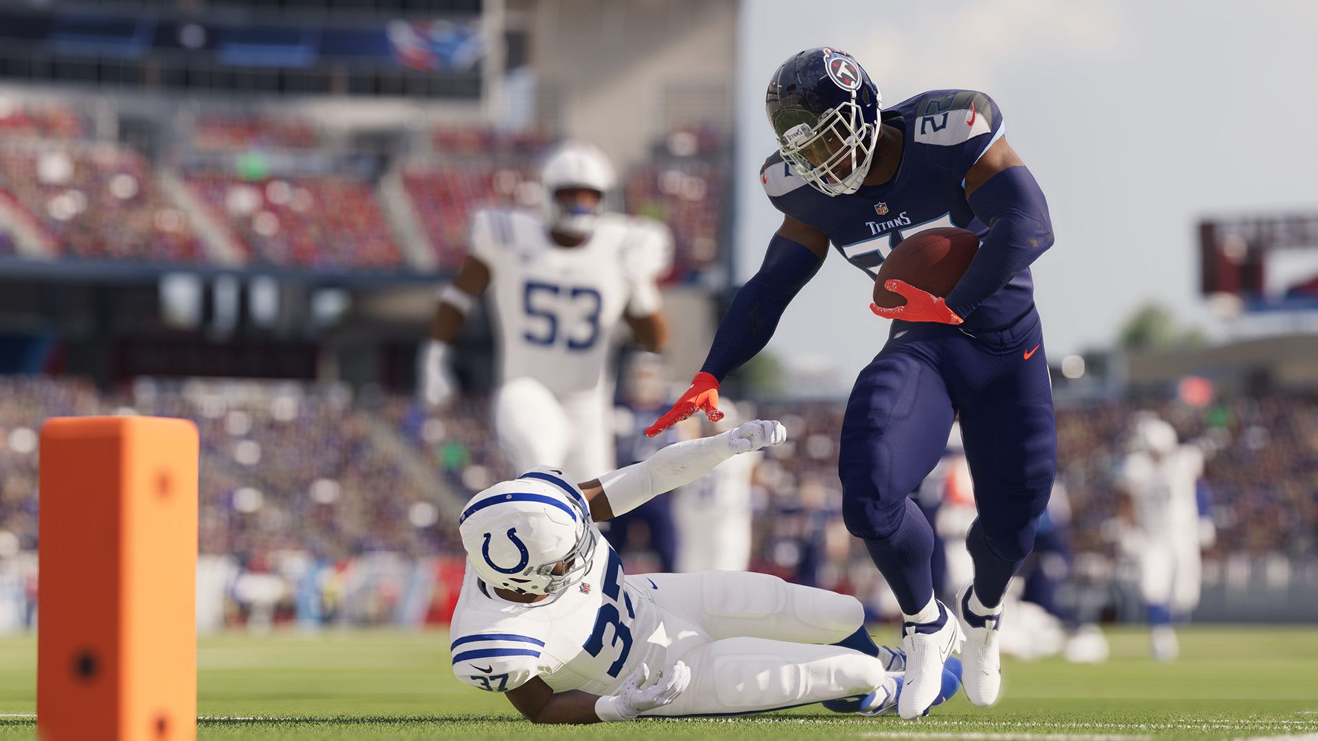 Video game screenshot of a football player running while holding the ball