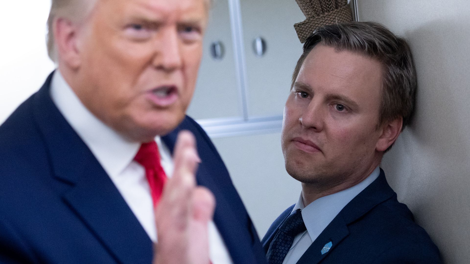 Campaign manager Bill Stepien with President Trump on Air Force One in August.