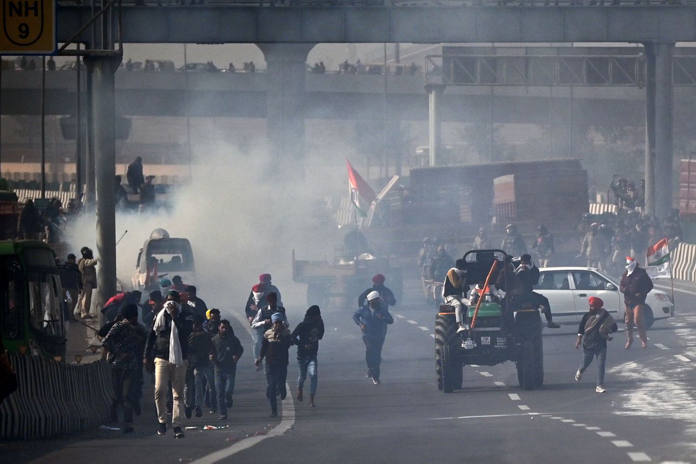 India Tractor Rally Police Fire Tear Gas On Protesting Farmers In Delhi Axios