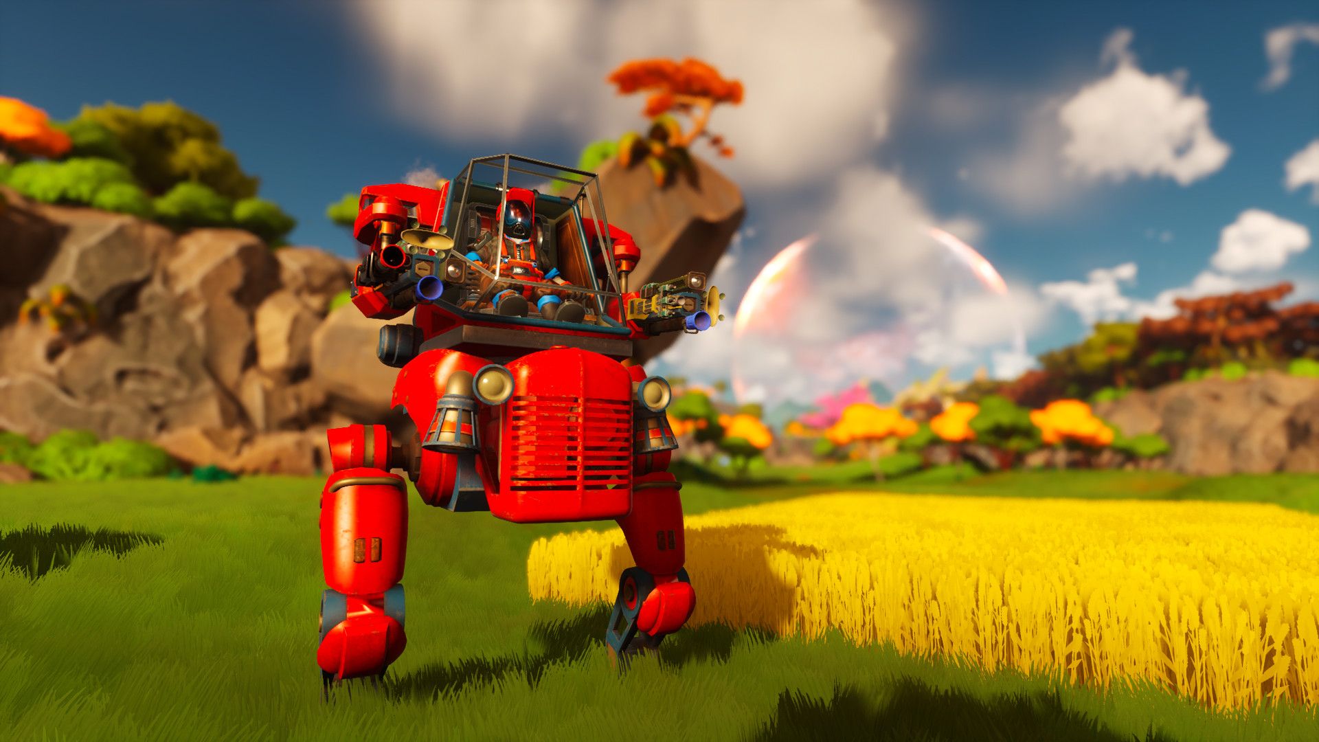 Video game screenshot of a person in a robot suit next to a field of wheat