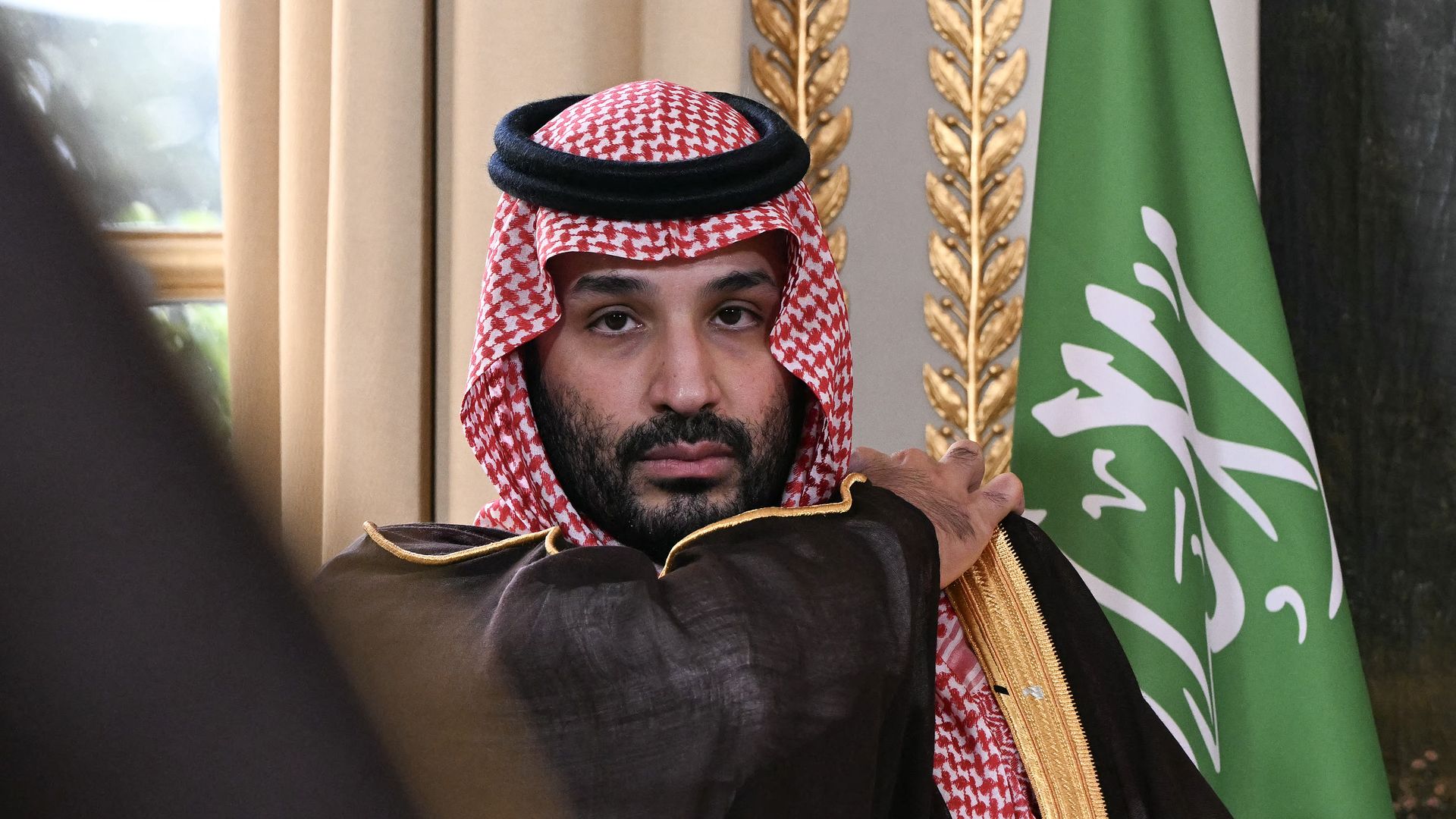 Saudi Arabia's Crown Prince Mohammed bin Salman looks on as he attends a trade agreement signature ceremony at the Elysee Palace in Paris.