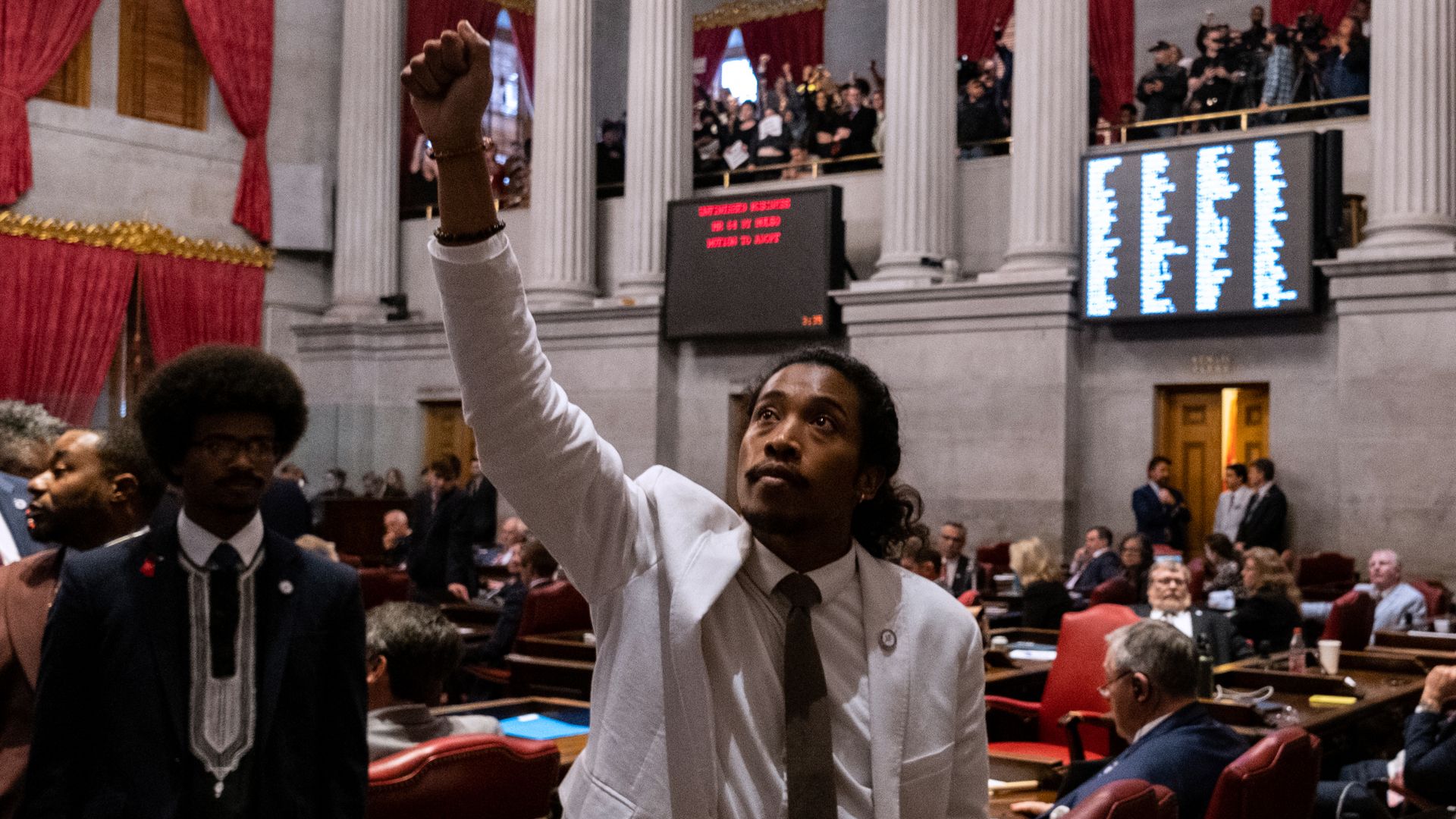 Justin Jones (right) and Justin Pearson on the House floor last week.