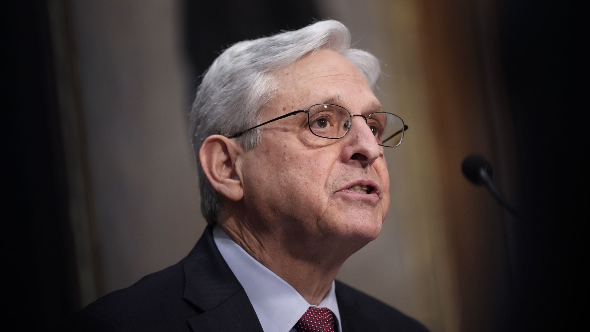 Merrick Garland speaks during a meeting 