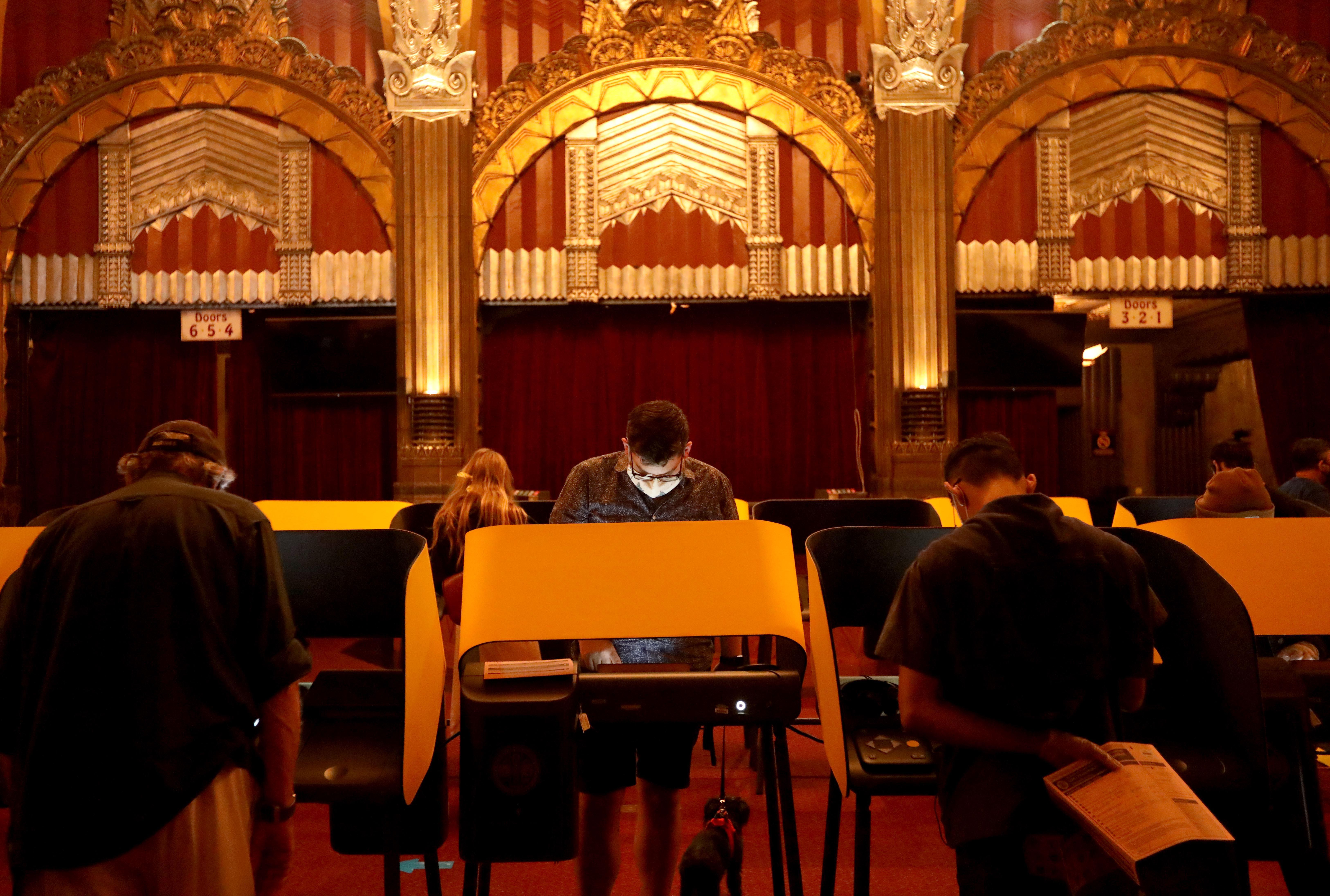  Voters cast their ballots on Election Day at the Pantages Theatre in Hollywood in Los Angeles on November 3