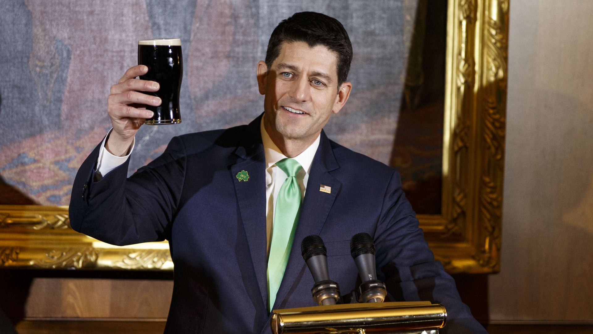 Paul Ryan raising a glass of beer