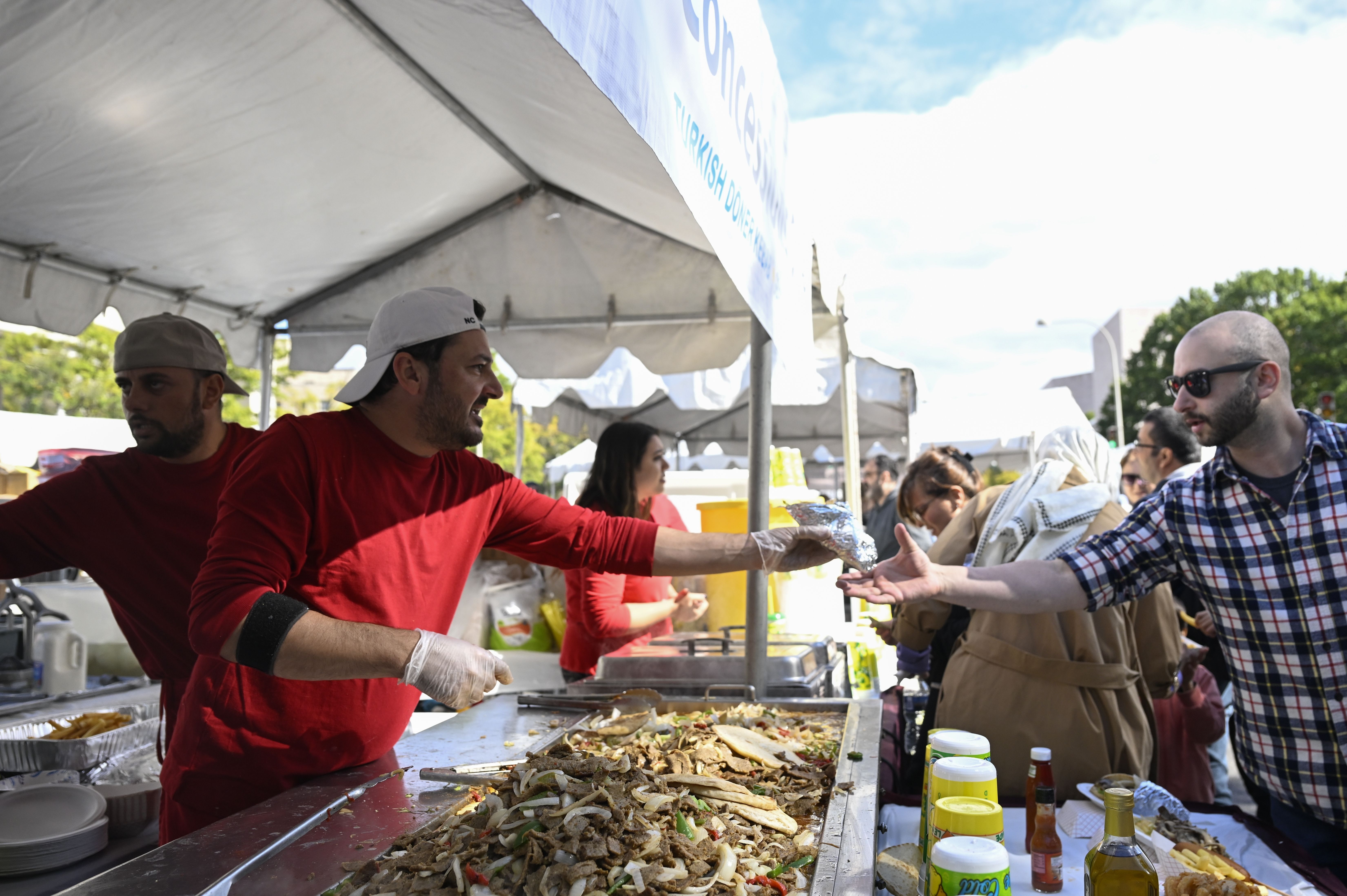 People visit the 2023 edition of the Turkish Festival organized by the American Turkish Association of Washington, DC (ATA-DC) annually, at Pennsylvania Avenue NW near the Capitol Building in United States on October 15, 2023. (Photo by Celal Gunes/Anadolu via Getty Images)