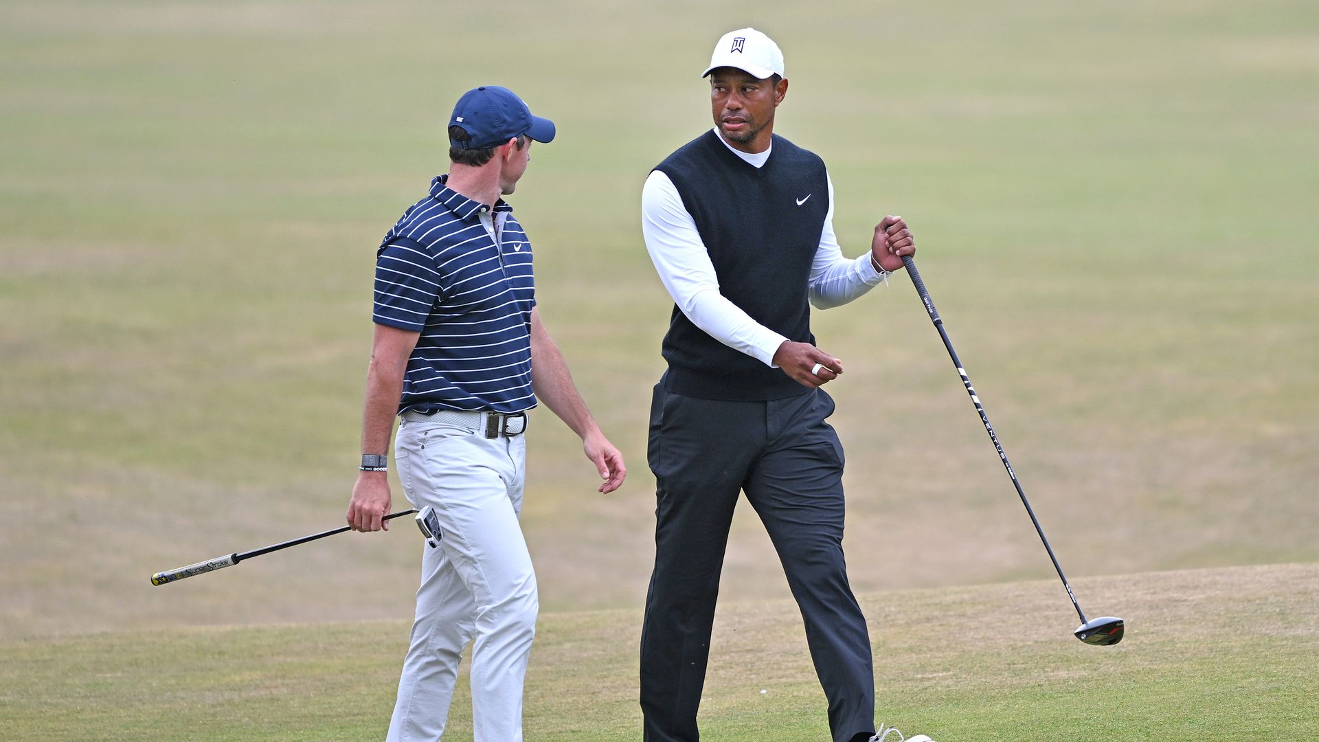 Tiger Woods and Rory McIlroy at a golf event.