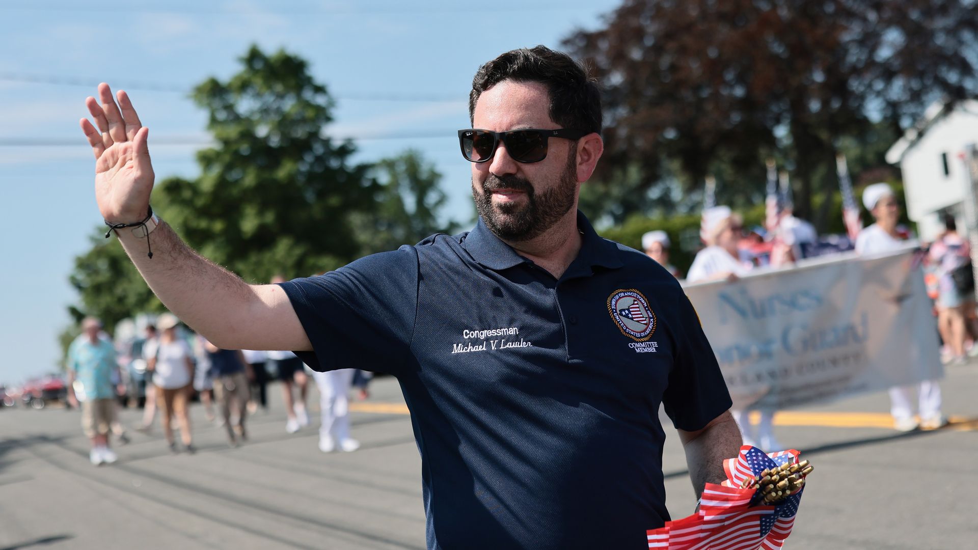 Rep. Mike Lawler marches in a parade on July 4 in Tappan, New York.