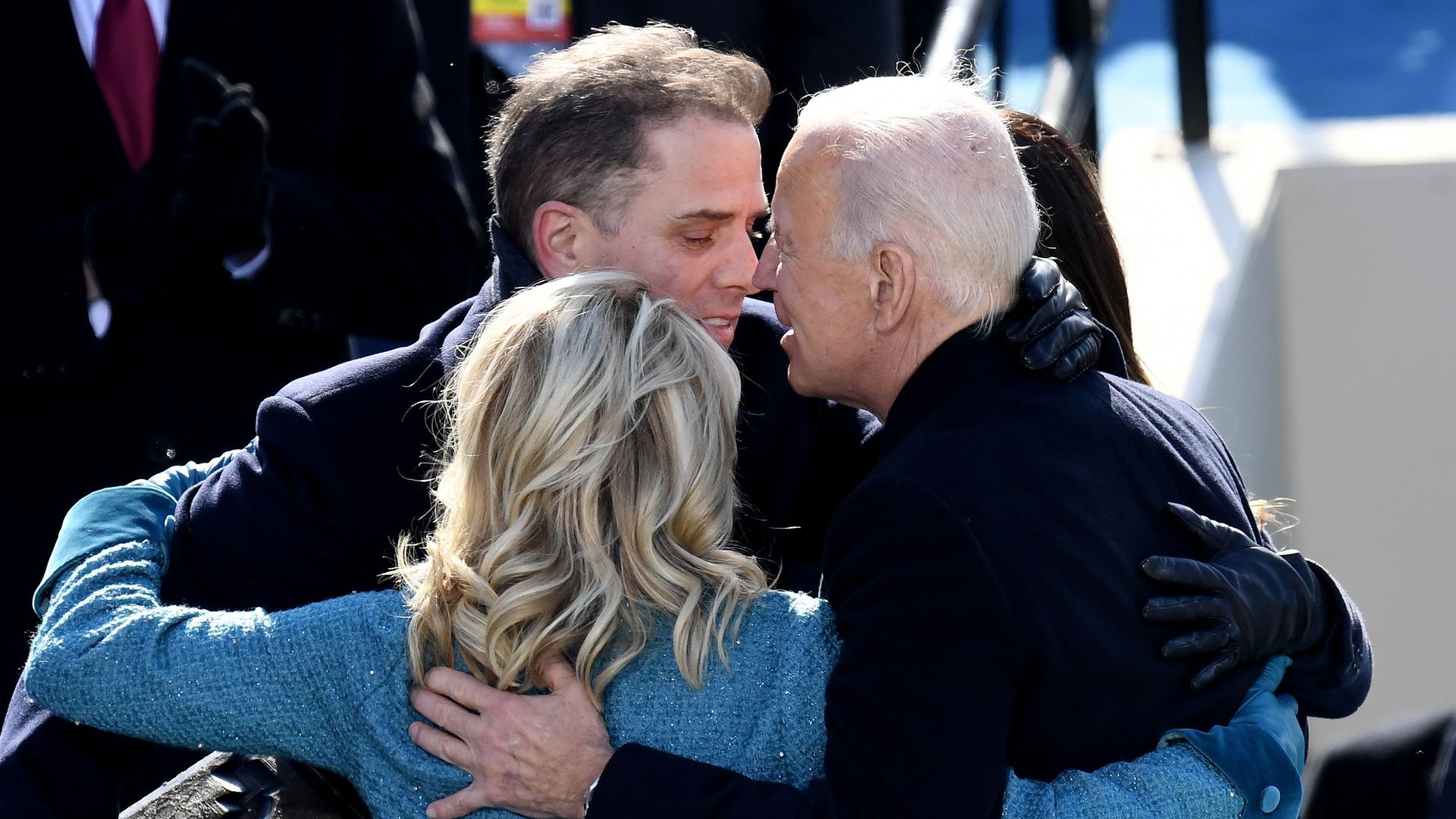 Hunter and Jill Biden are seen hugging Joe Biden after he was sworn in as president of the United States.