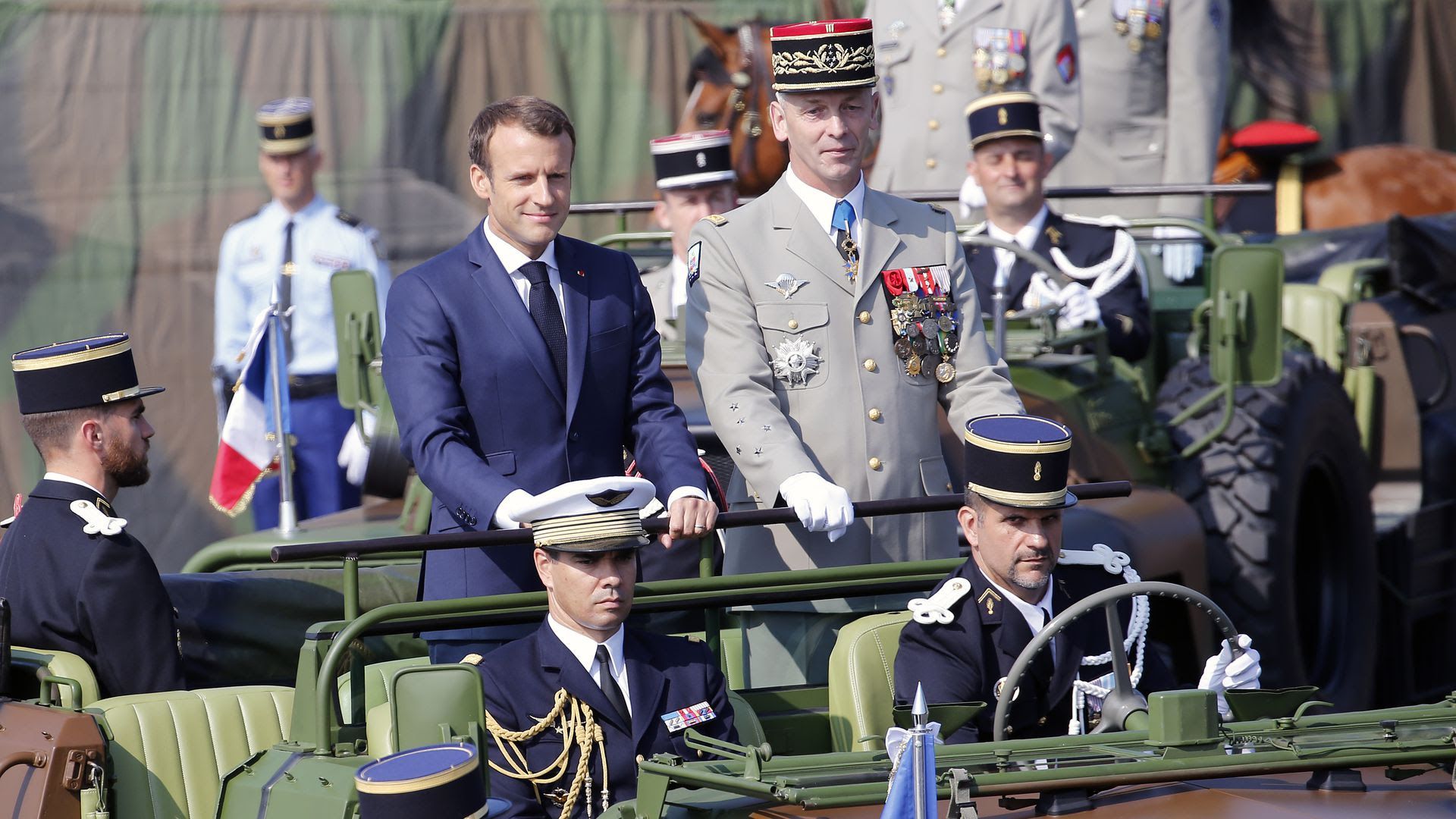 Macron parades down the Champs-Elysees on Bastille Day