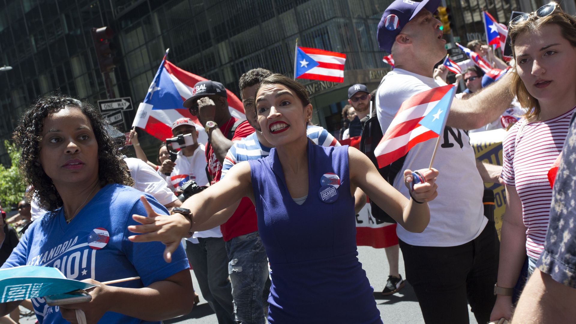 Rep. Alexandria Ocasio-Cortez is seen marching in New York City's 2019 Puerto Rican Day parade.