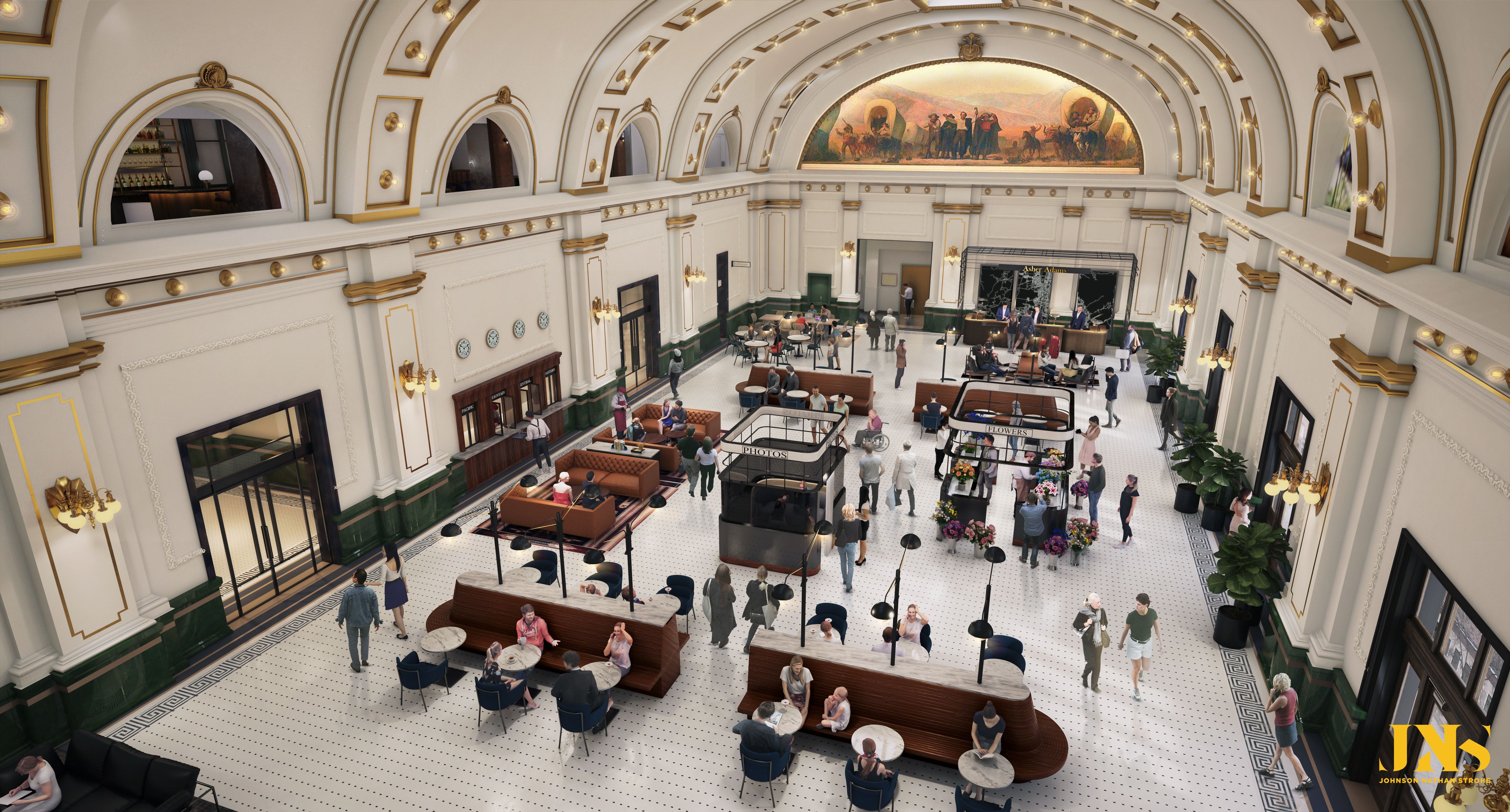 A train depot with a vaulted ceiling and cafe tables.