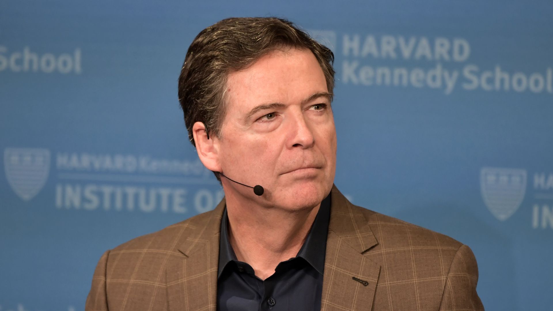 Former FBI Director James Comey speaks at Harvard Kennedy School with Harvard's Eric Rosenbach on February 24, 2020.