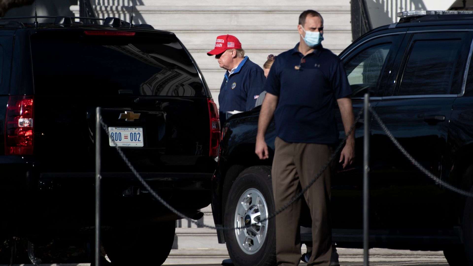 Dressed in a red MAGA had, President Trump heads to the golf course on Sunday.