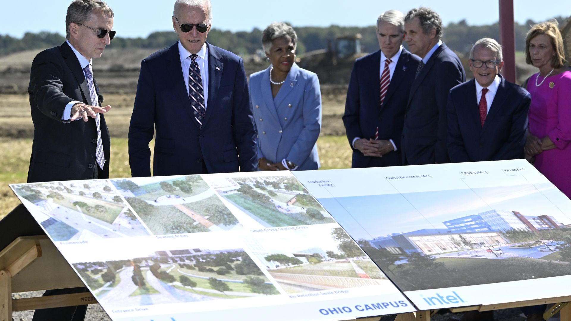 Intel CEO Pat Gelsinger, President Joe Biden and other politicians review photo renderings of a new semiconductor plant in Central Ohio. 
