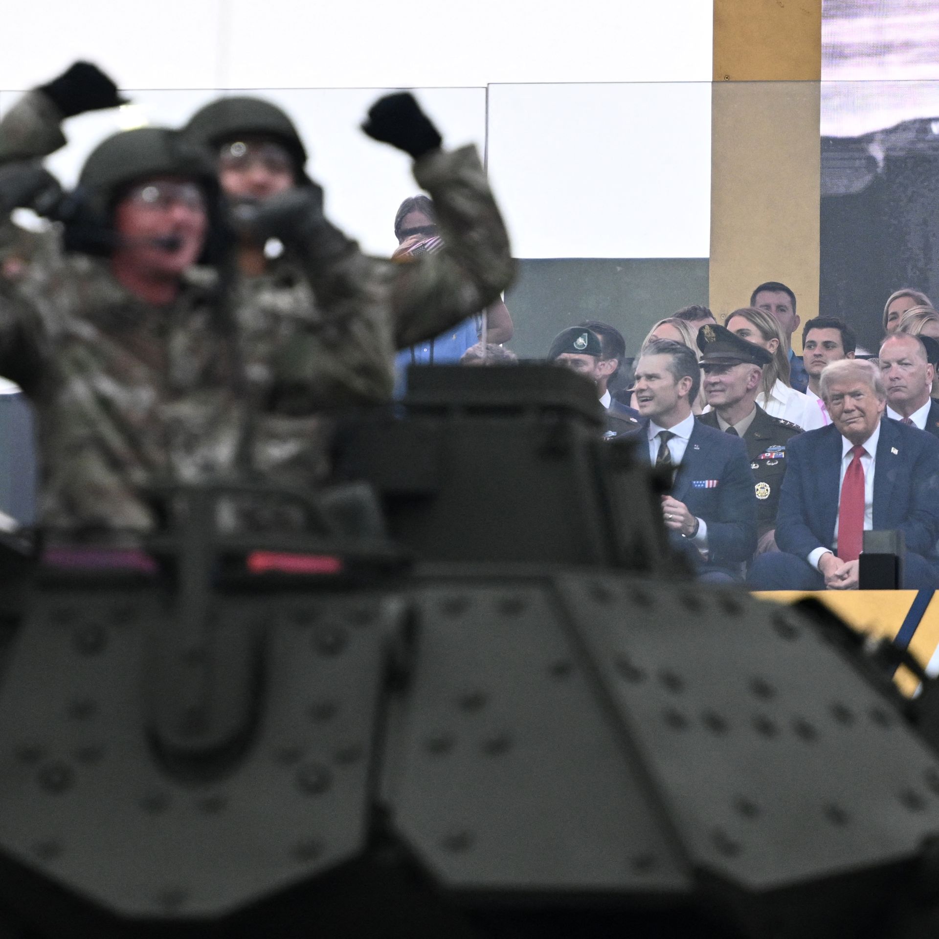 Trump hosts military parade as protests held across US, in photos