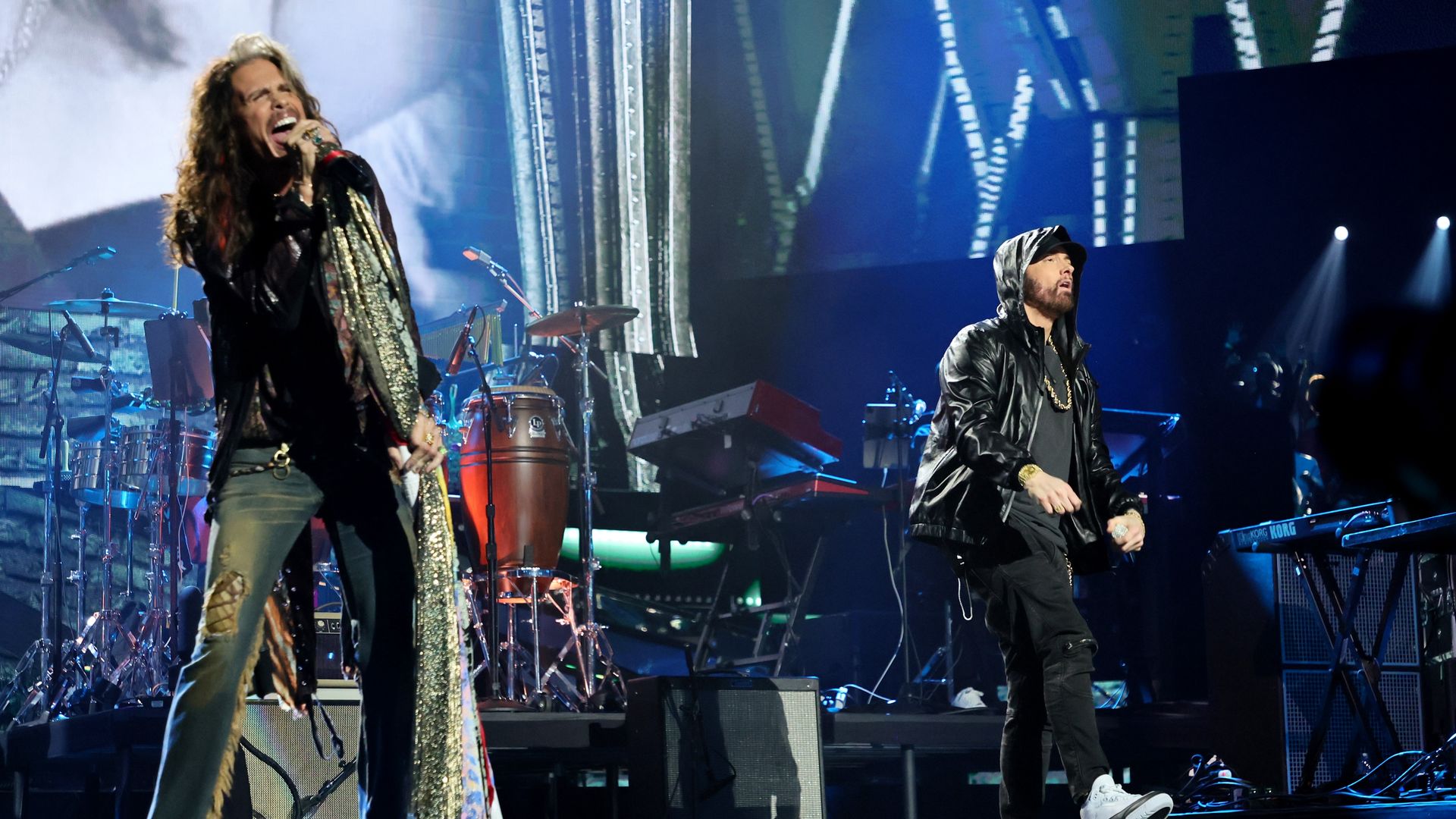 Steven Tyler of Aerosmith and Eminem perform on stage together. 