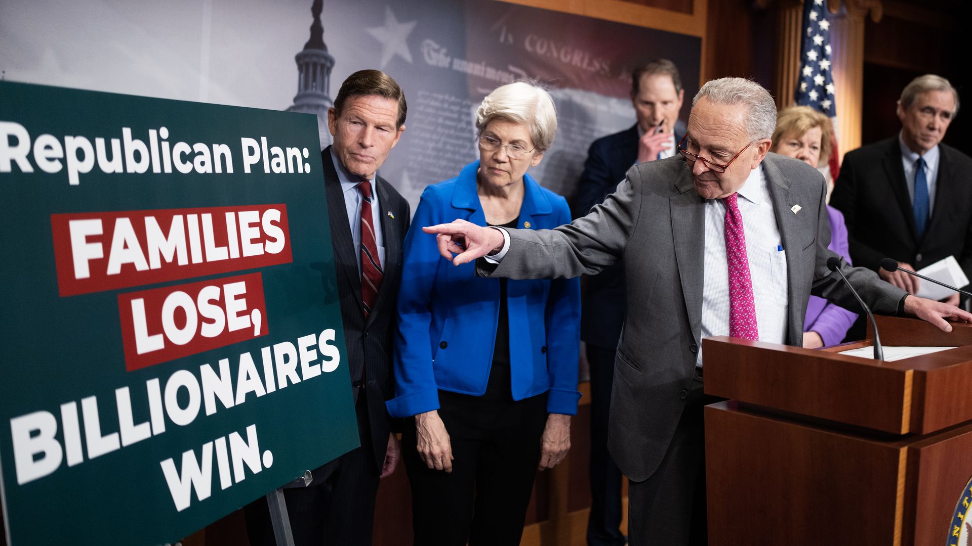 From left, Sens. Richard Blumenthal, D-Conn., Elizabeth Warren, D-Mass., Ron Wyden, D-Ore., Senate Minority Leader Charles Schumer, D-N.Y., Tammy Baldwin, D-Wis., and Jeff Merkley, D-Ore., conduct a news conference in the U.S. Capitol to voice opposition to the Senate Republicans' budget resolution 