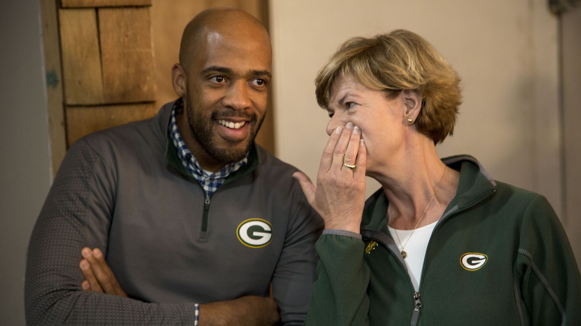 Sen. Tammy Baldwin is seen speaking with Wisconsin Lt. Gov. Mandela Barnes.