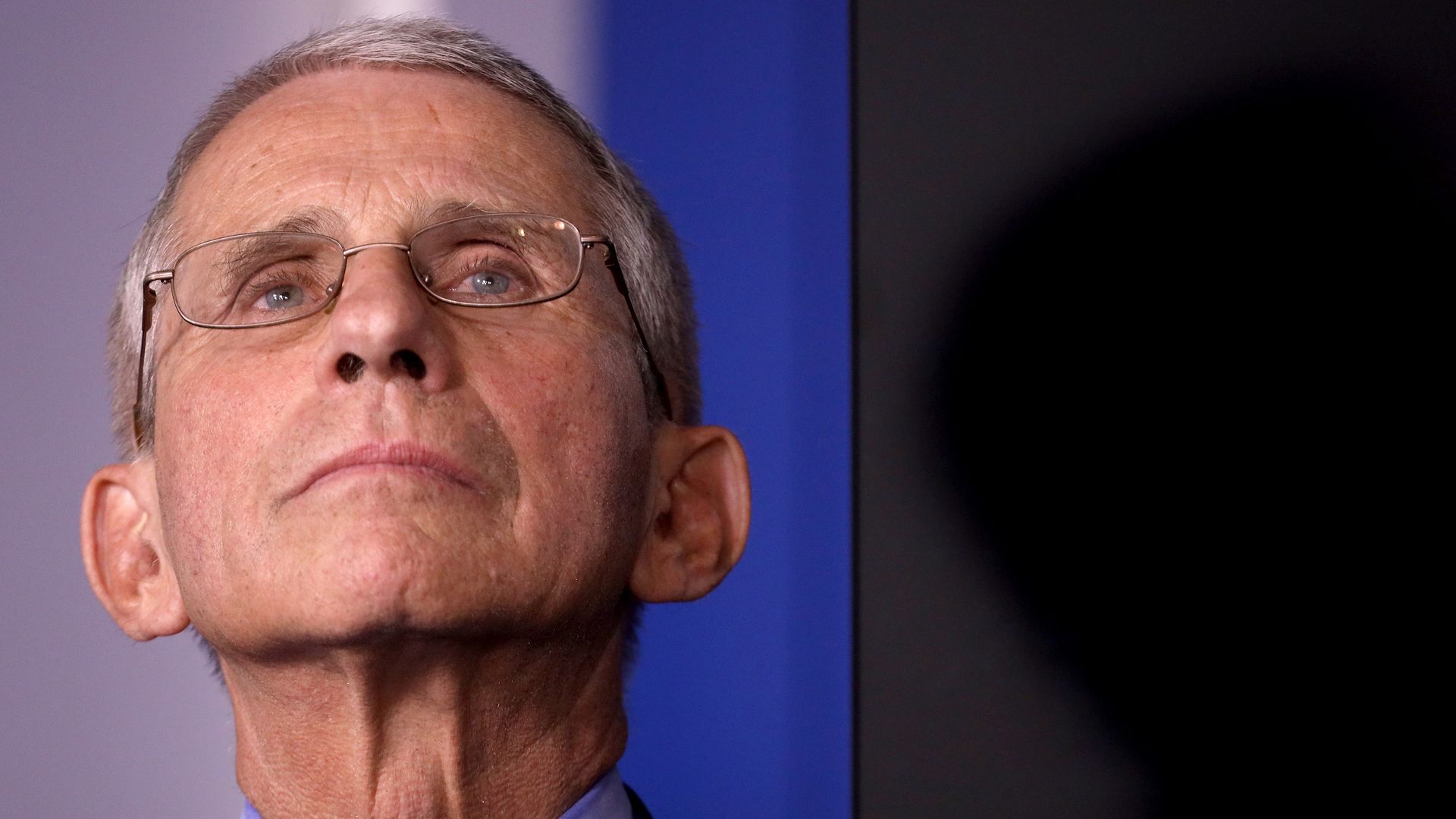Anthony Fauci (L), director of the National Institute of Allergy and Infectious Diseases, participates in the daily coronavirus task force briefing