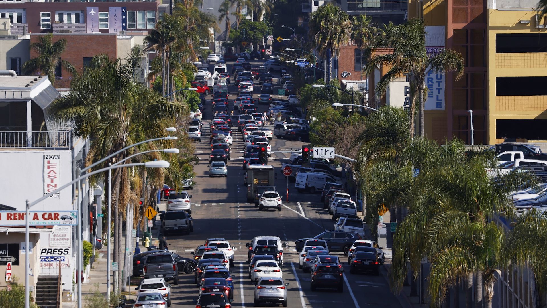 Cars sit in traffic on a street in downtown San Diego. 