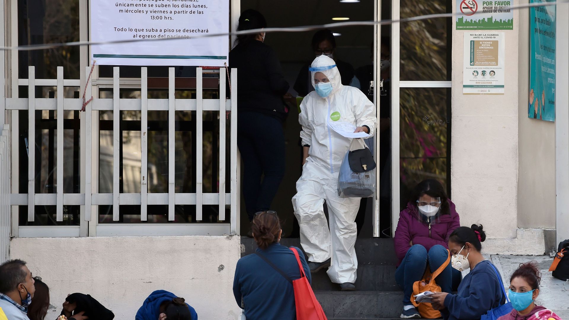 Relatives of patients hospitalized in the General Hospital of Zone 1 of the Mexican Social Security Institute (IMSS) wait for reports in Mexico City