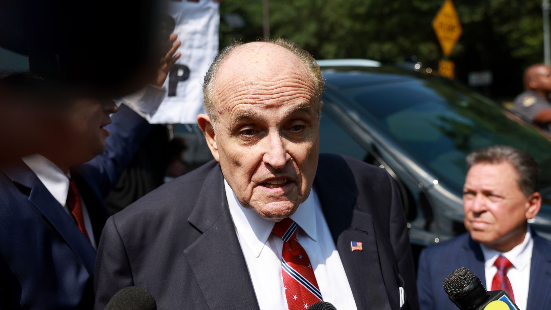Rudy Giuliani speaks to the media after leaving the Fulton County jail on August 23, 2023 in Atlanta, Georgia.