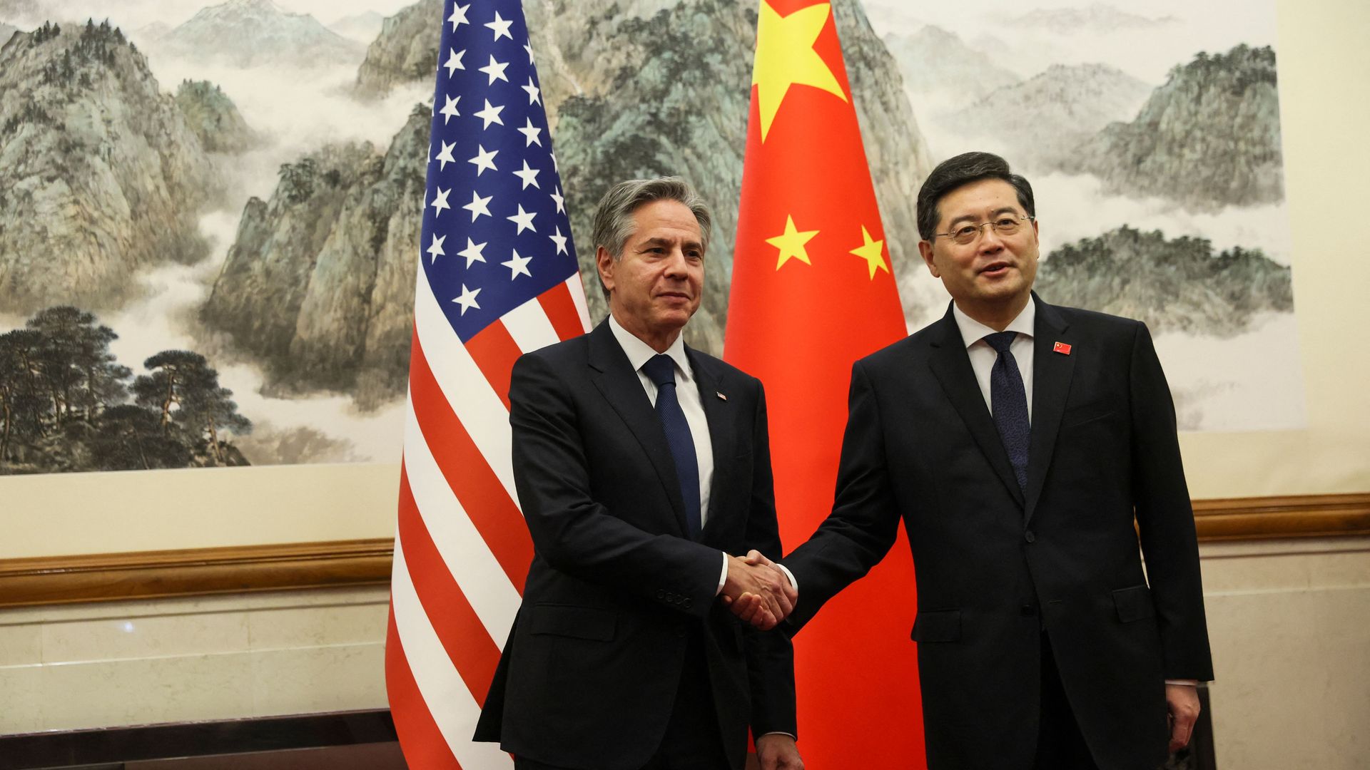 US Secretary of State Antony Blinken (L) and China's Foreign Minister Qin Gang shake hands ahead of a meeting at the Diaoyutai State Guesthouse in Beijing on June 18, 2023. (Photo by LEAH MILLIS / POOL / AFP) (Photo by LEAH MILLIS/POOL/AFP via Getty Images)