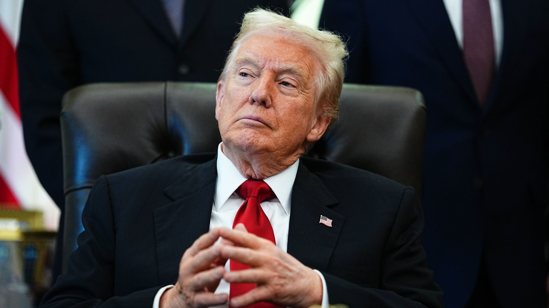 President Donald Trump sitting at the resolute desk in the Oval Office of the White House on Nov. 6. Photo: Aaron Schwartz/Bloomberg via Getty Images