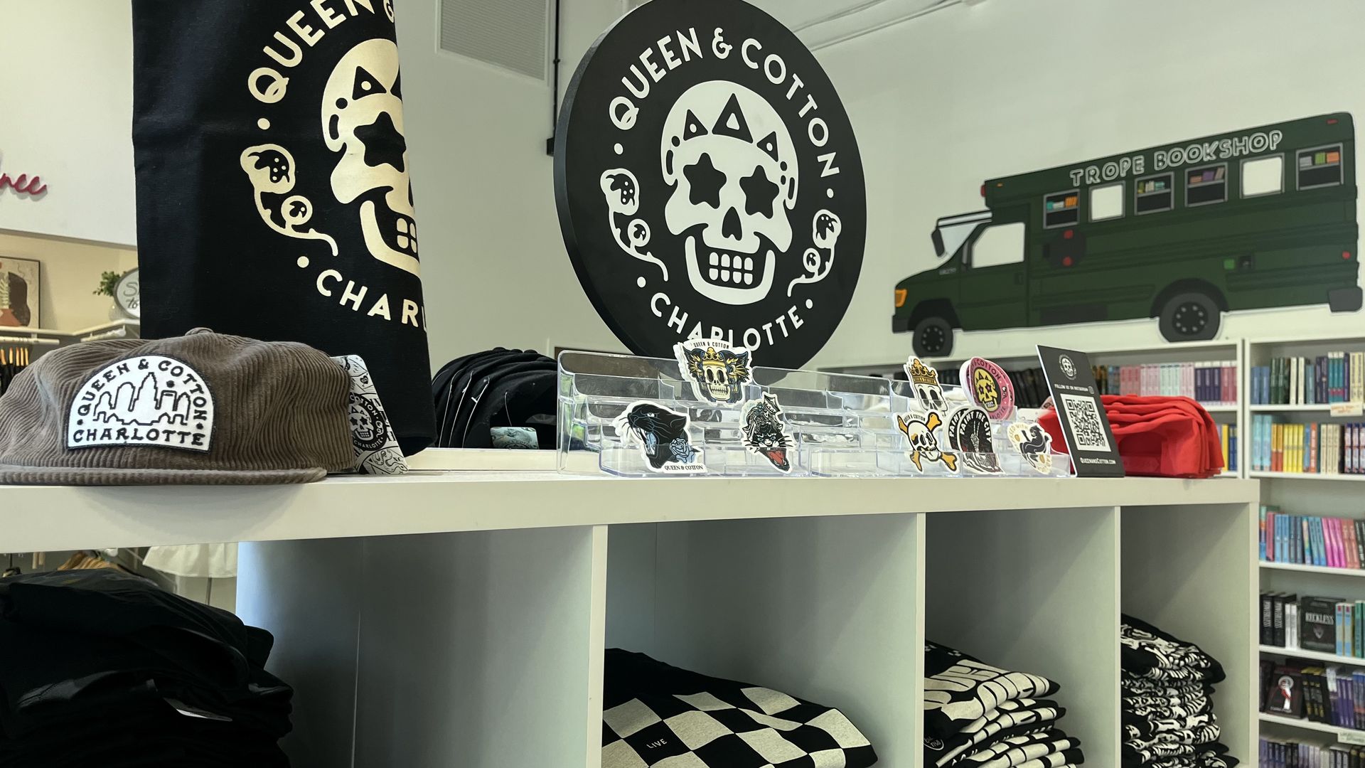 Queen & Cotton merchandise set up in a store