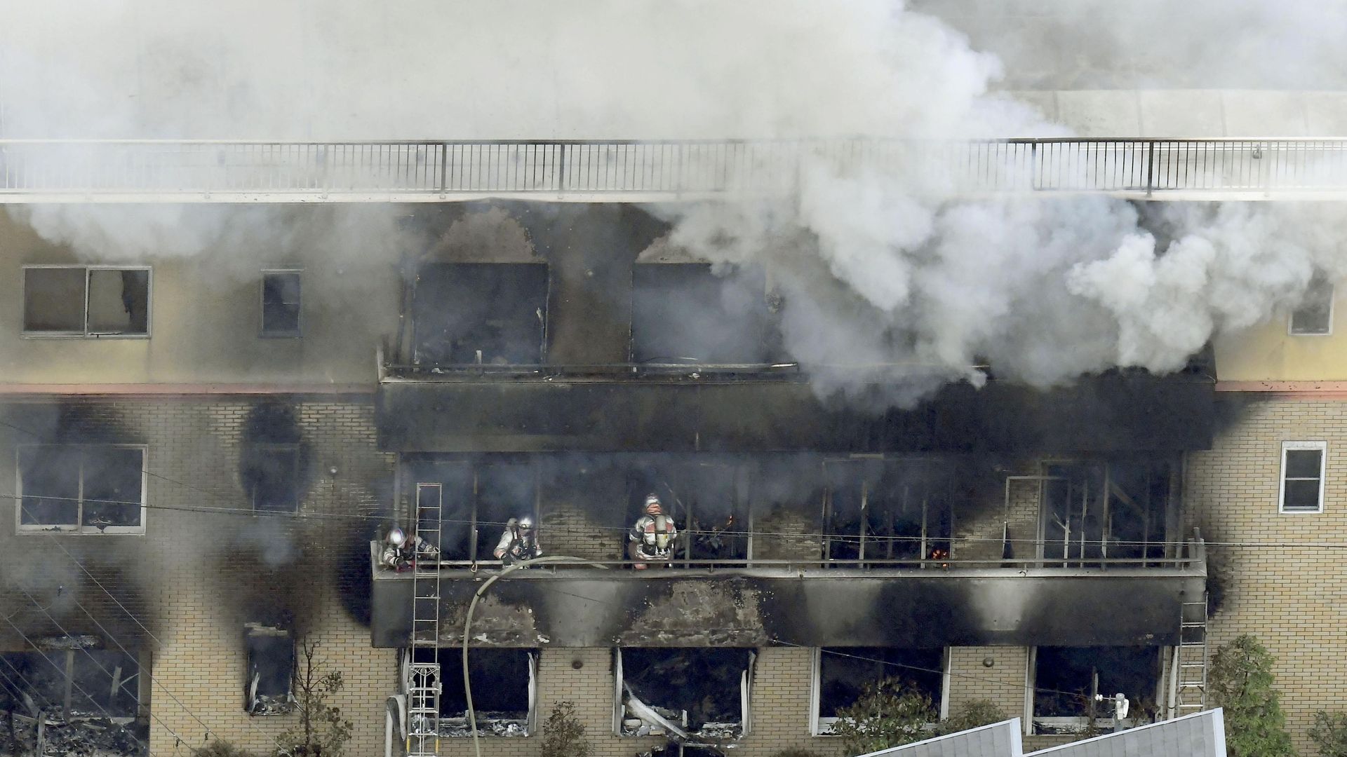 Firefighters battle a blaze at Kyoto Animation in Japan.